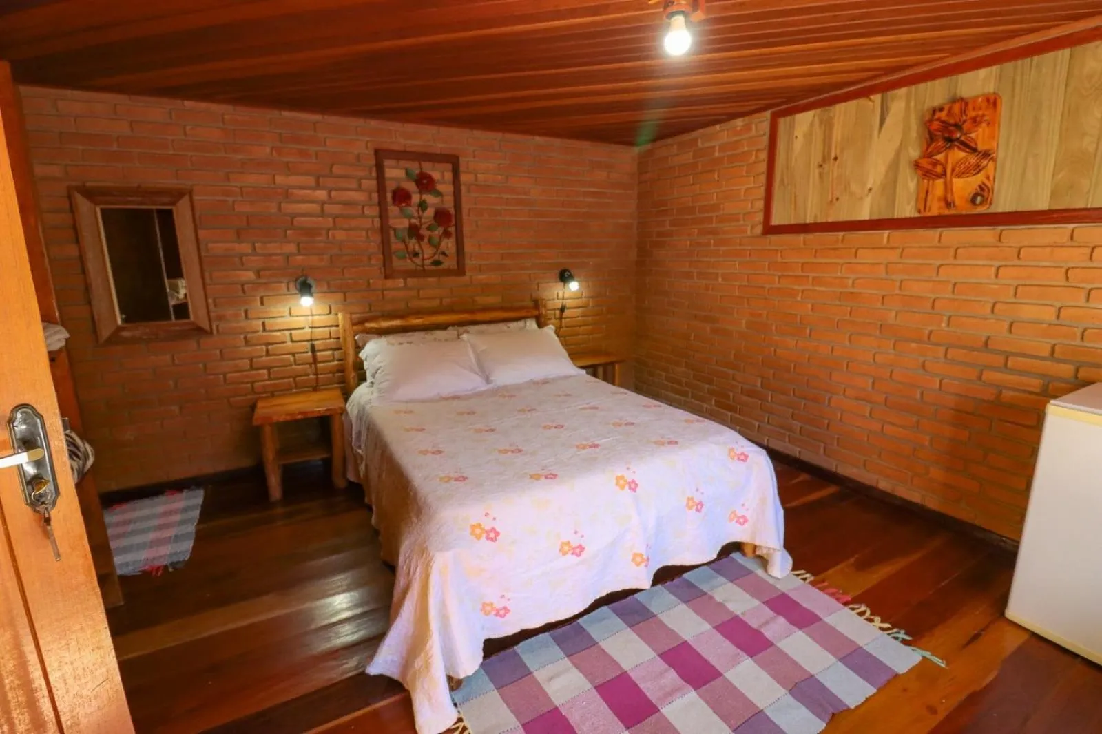 Bed in Pousada Das Araucárias