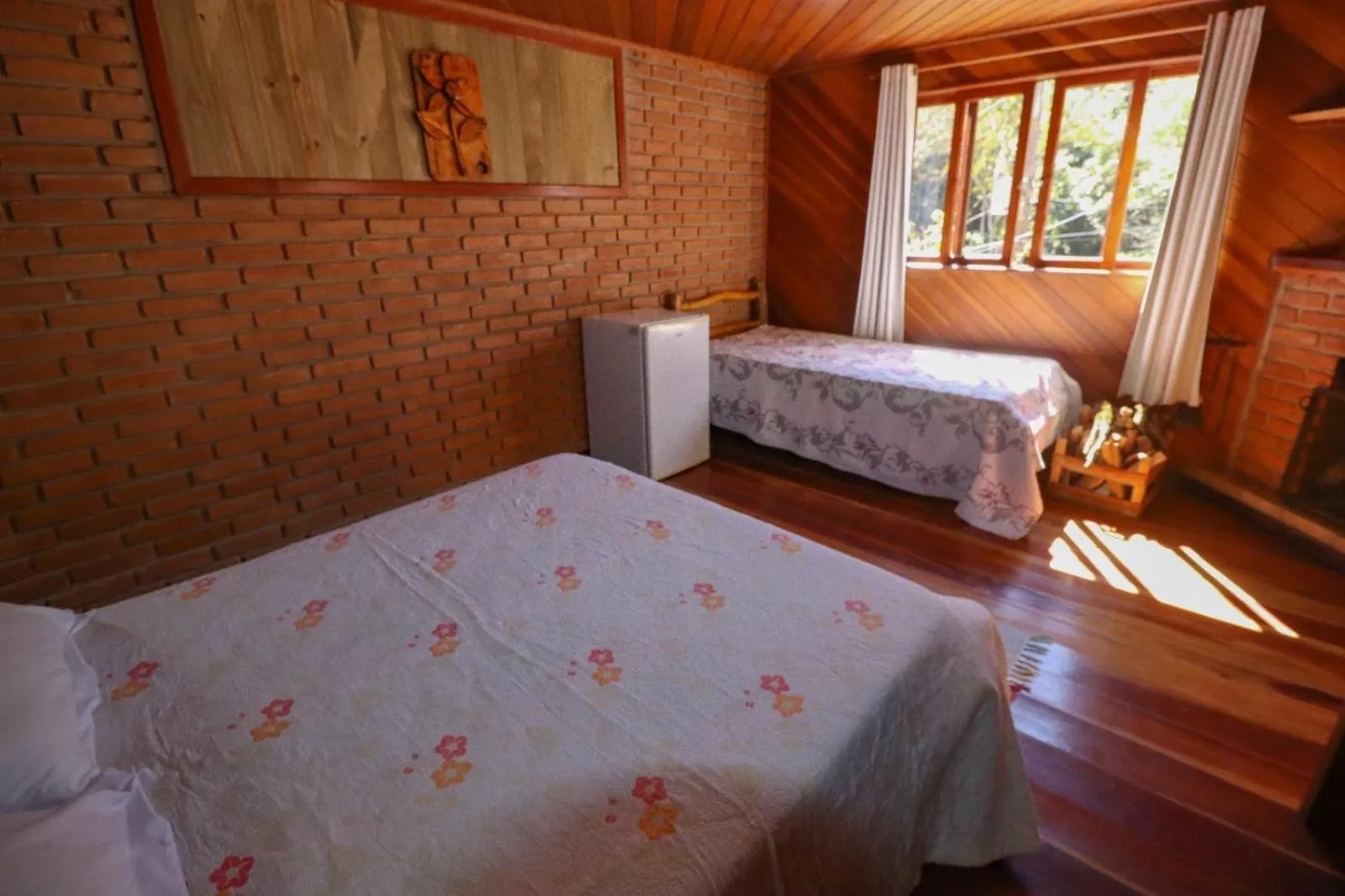 Bed in Pousada Das Araucárias