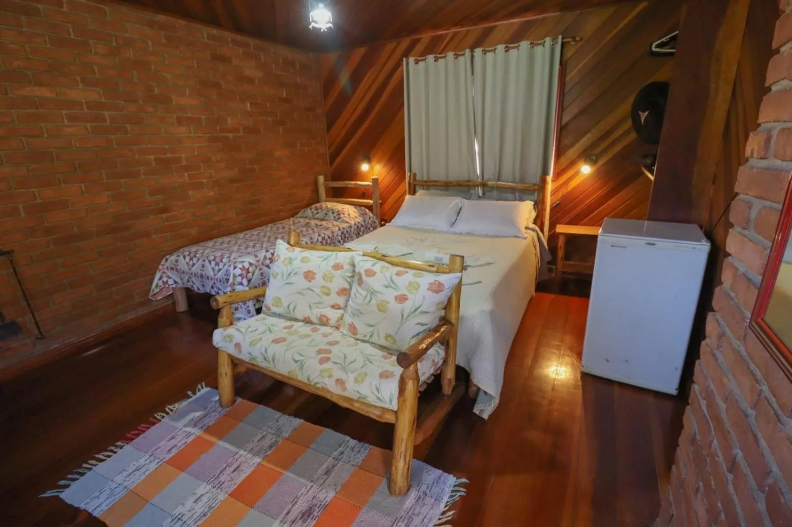 Bed in Pousada Das Araucárias