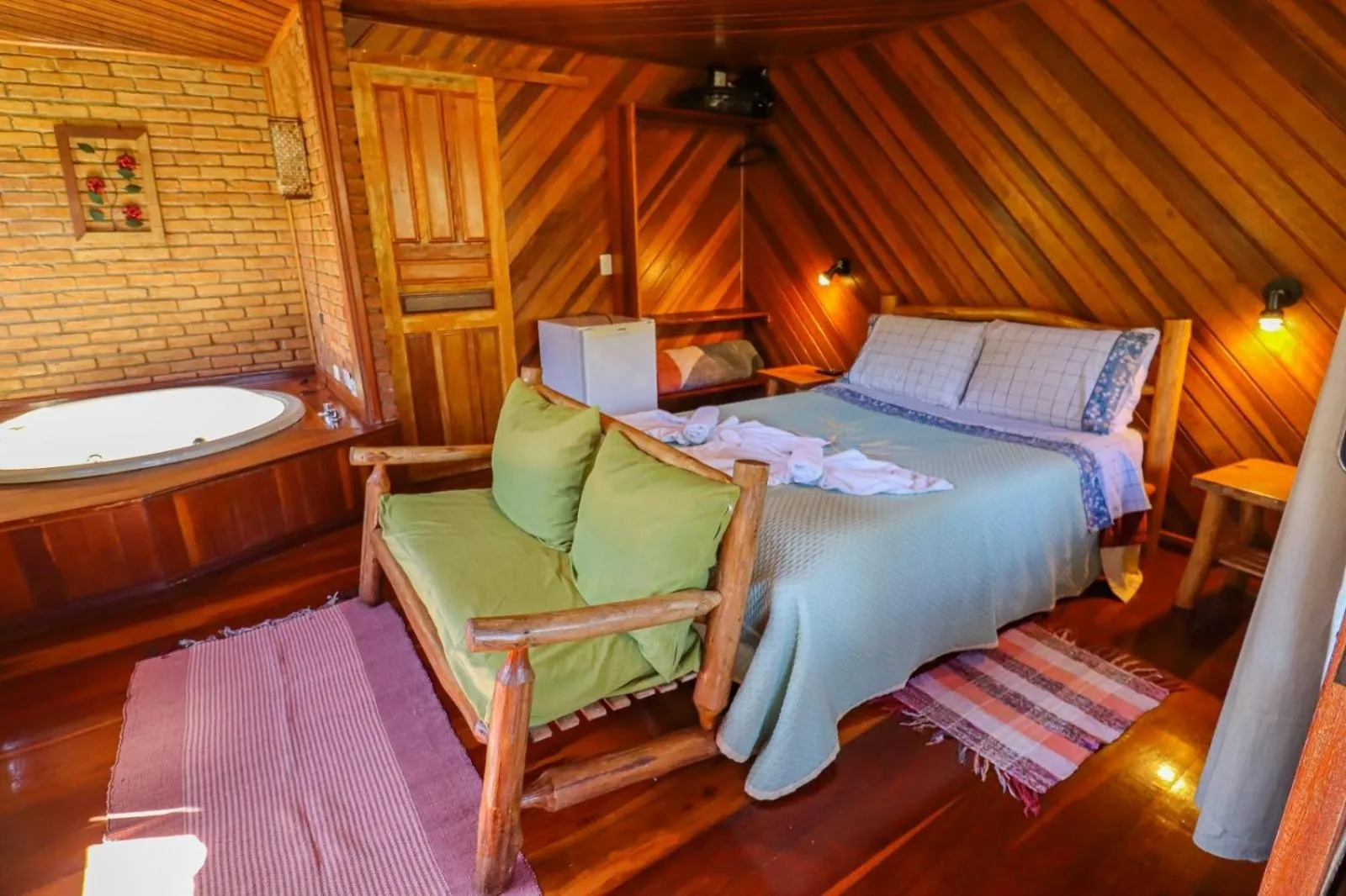 Bed in Pousada Das Araucárias