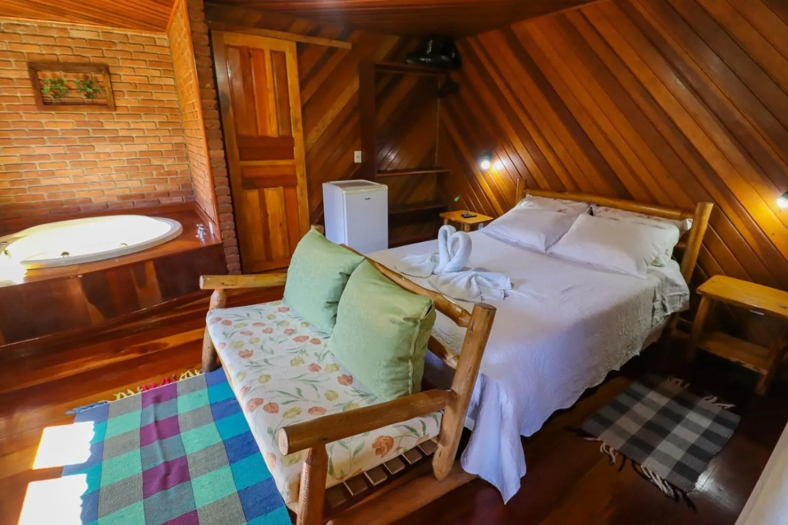 Bed in Pousada Das Araucárias