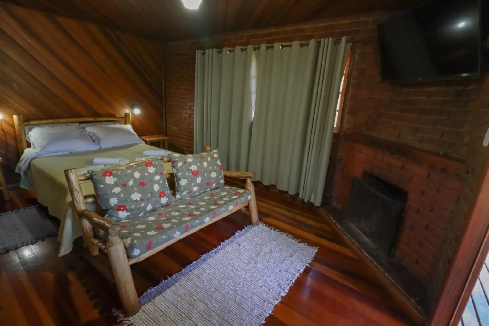 Bed in Pousada Das Araucárias