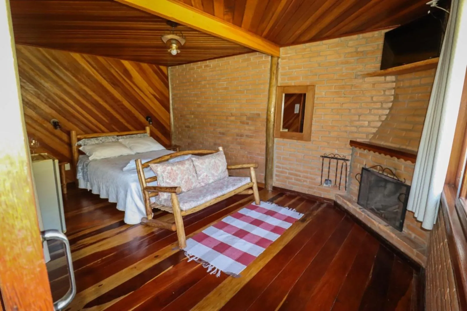 Bed in Pousada Das Araucárias