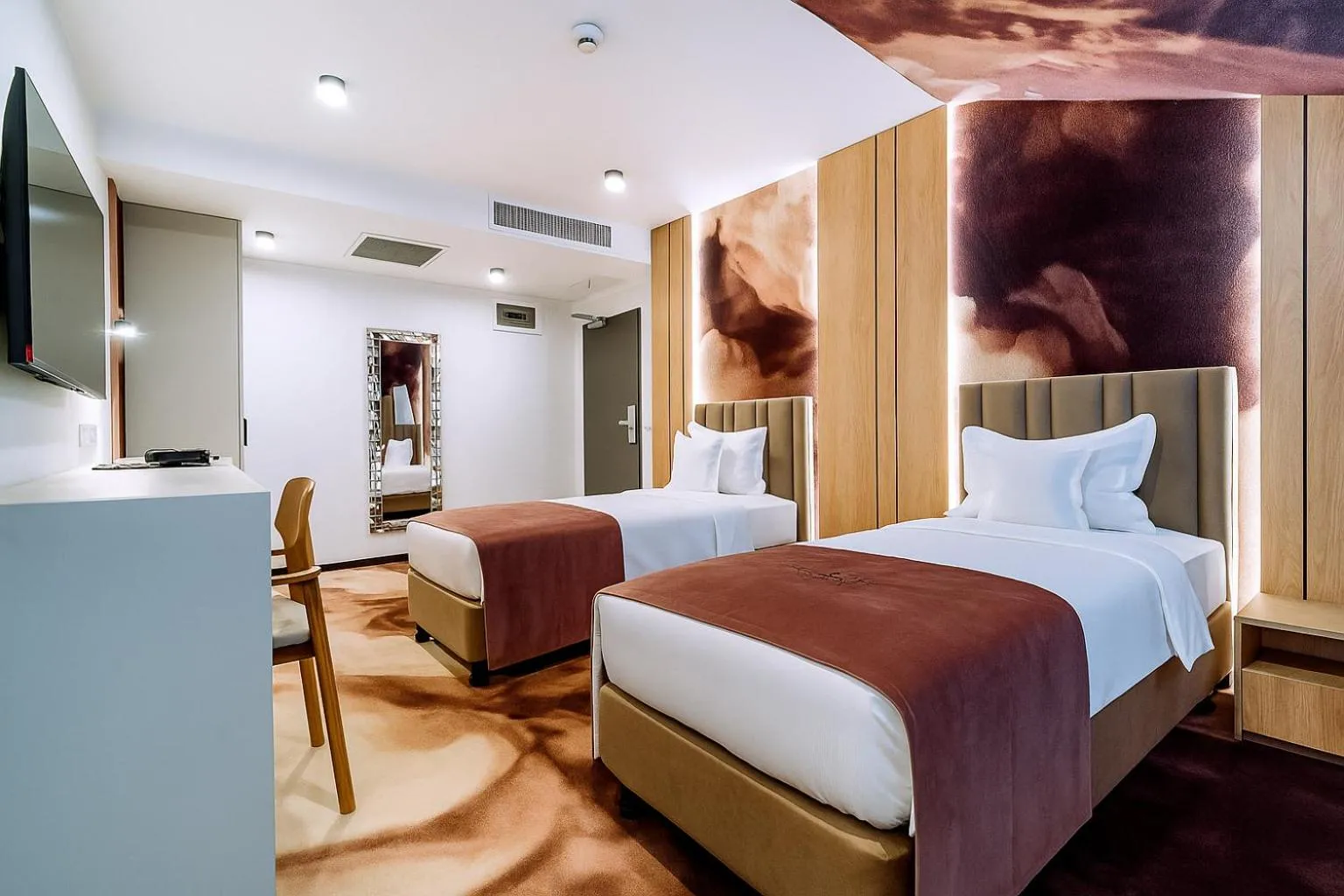 Bed in ARIS Boutique Hotel & SPA
