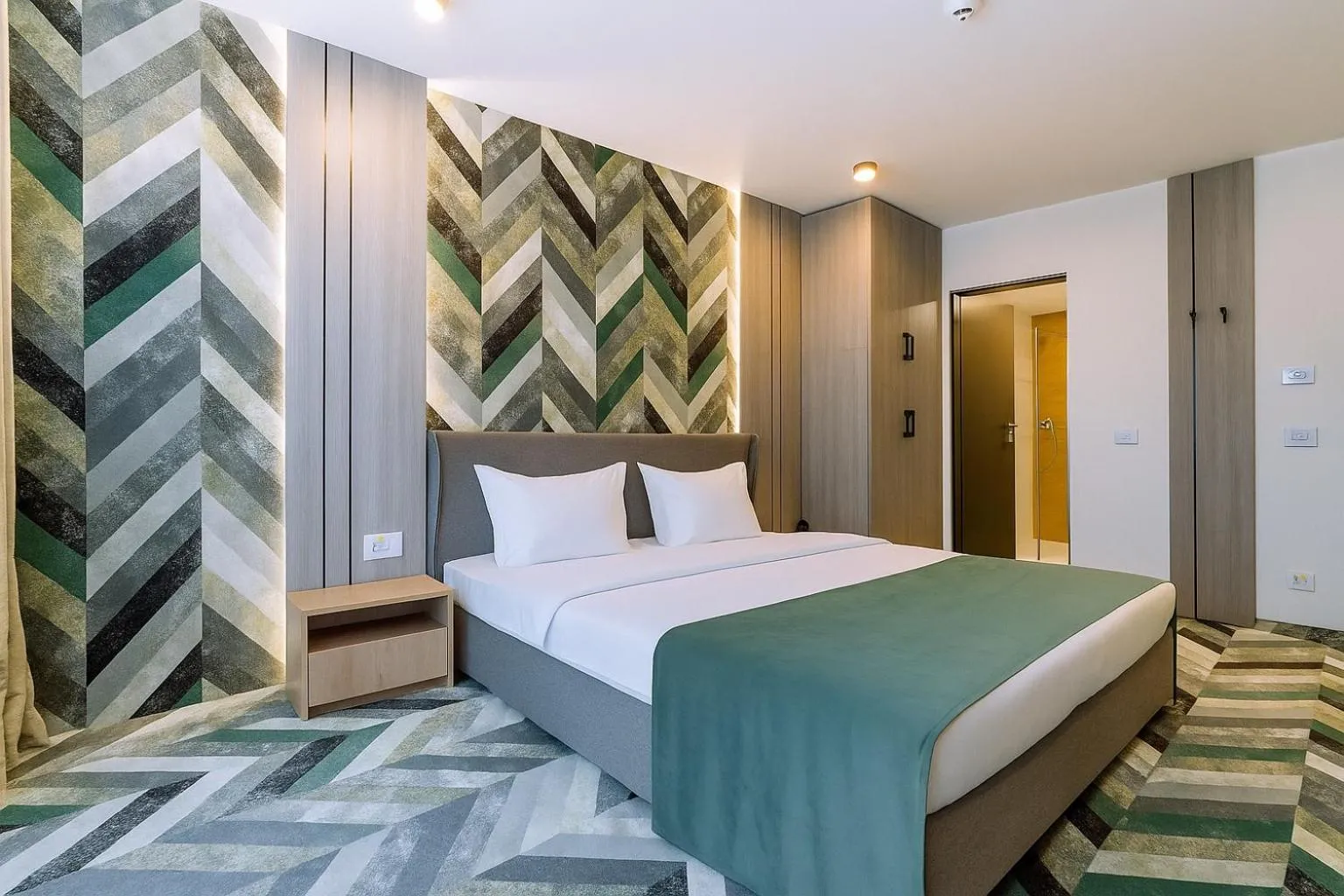 Bed in ARIS Boutique Hotel & SPA