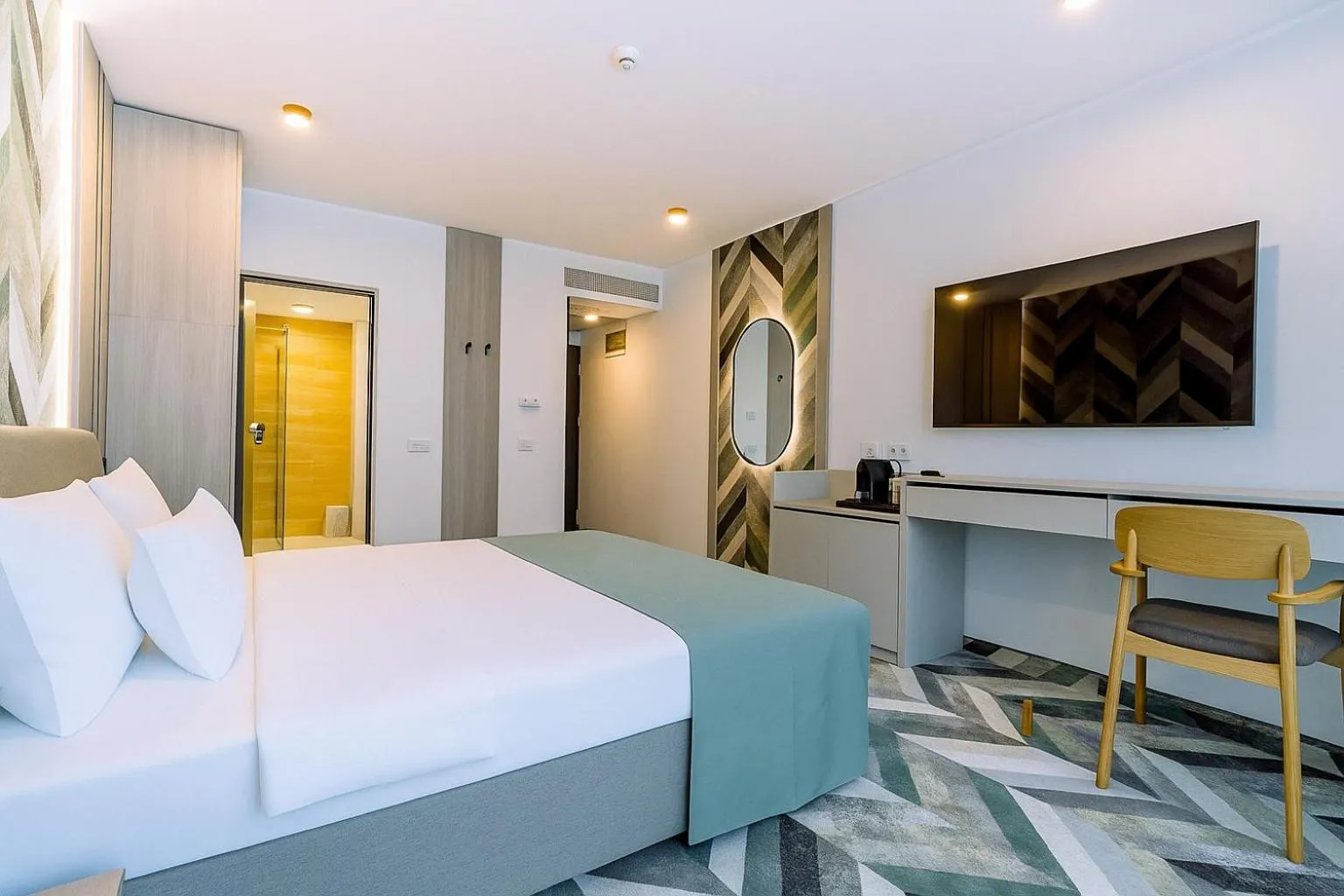 Bed in ARIS Boutique Hotel & SPA