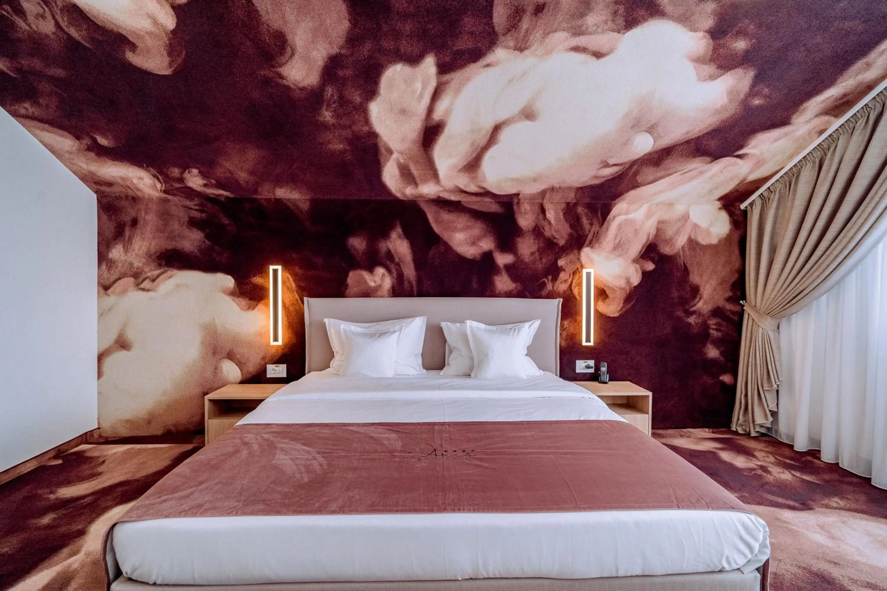 Bed in ARIS Boutique Hotel & SPA
