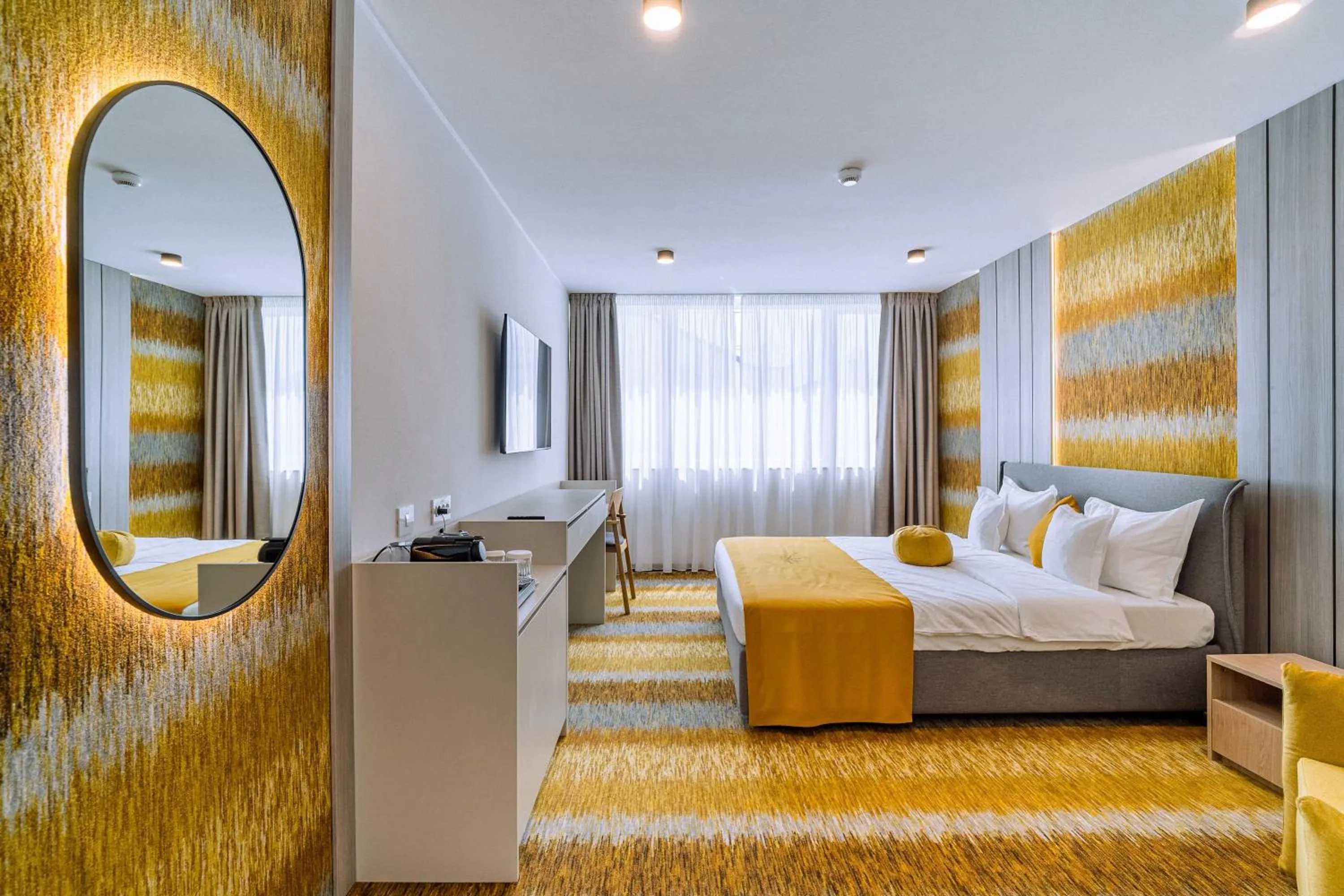 Bed in ARIS Boutique Hotel & SPA