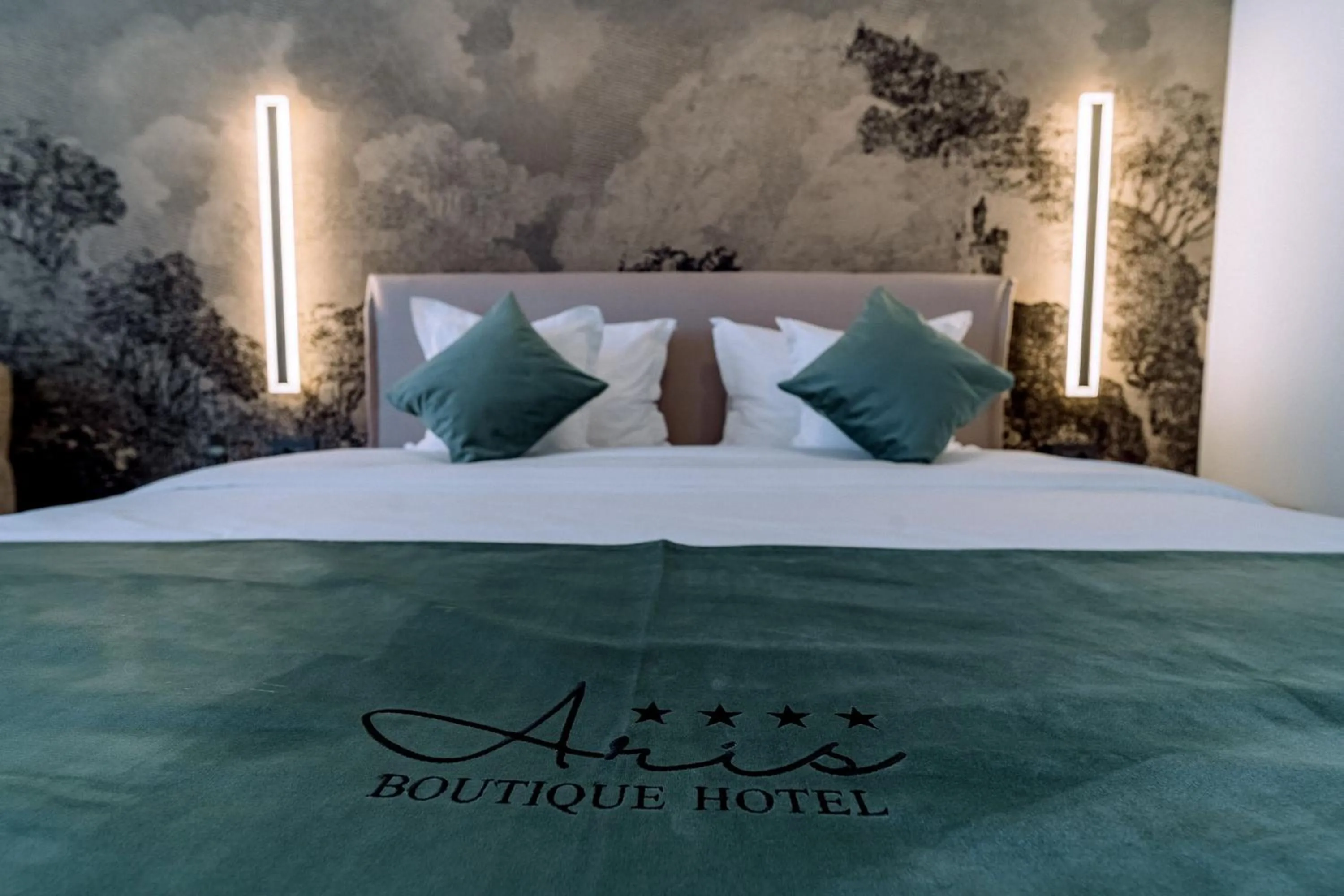 Bed in ARIS Boutique Hotel & SPA