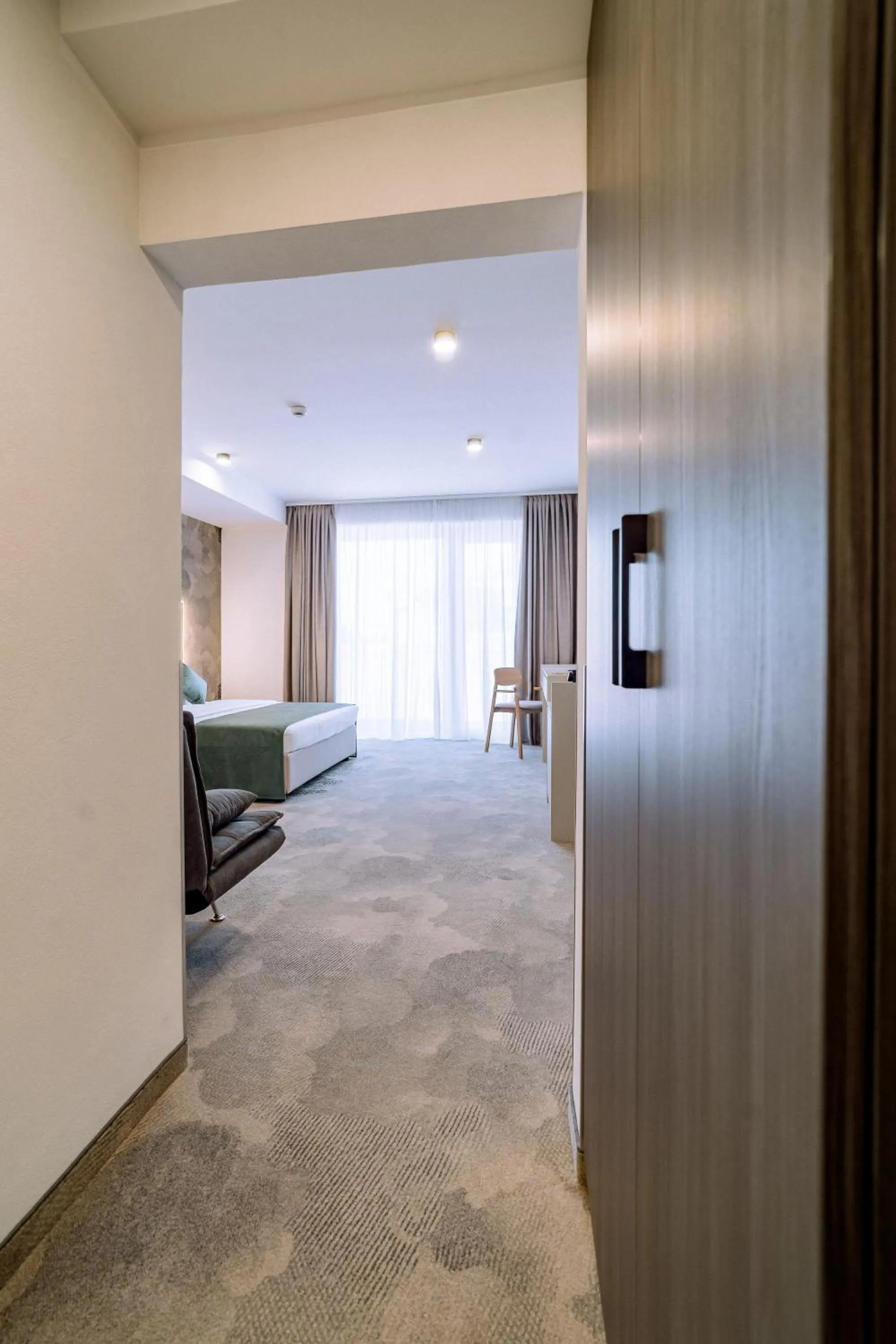 Bed in ARIS Boutique Hotel & SPA