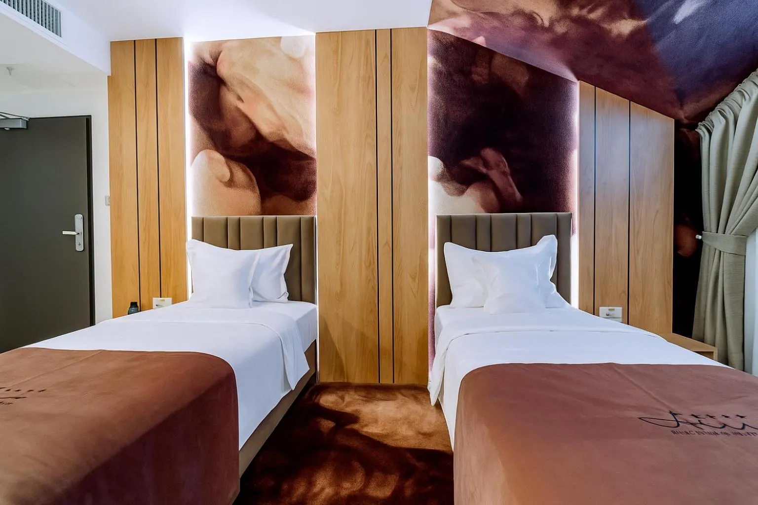 Bed in ARIS Boutique Hotel & SPA