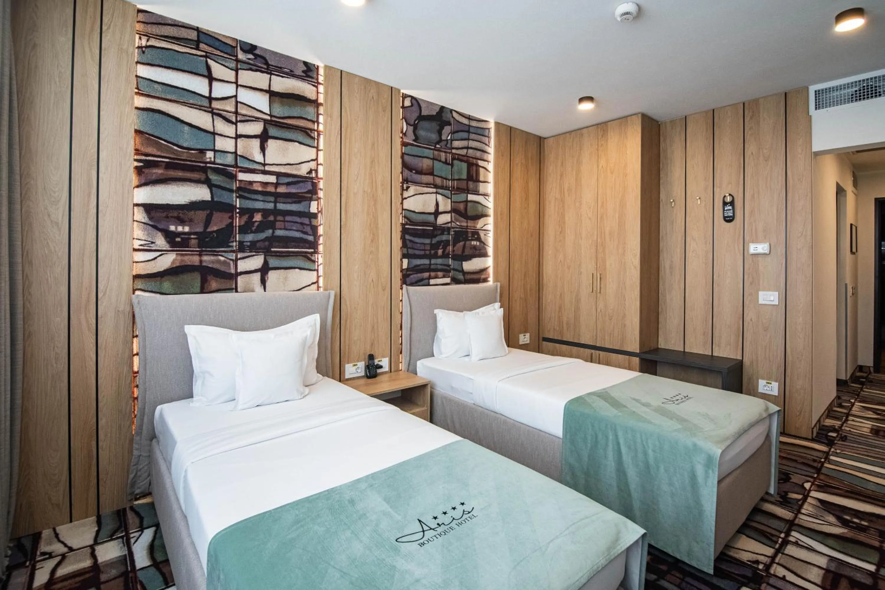 Bed in ARIS Boutique Hotel & SPA