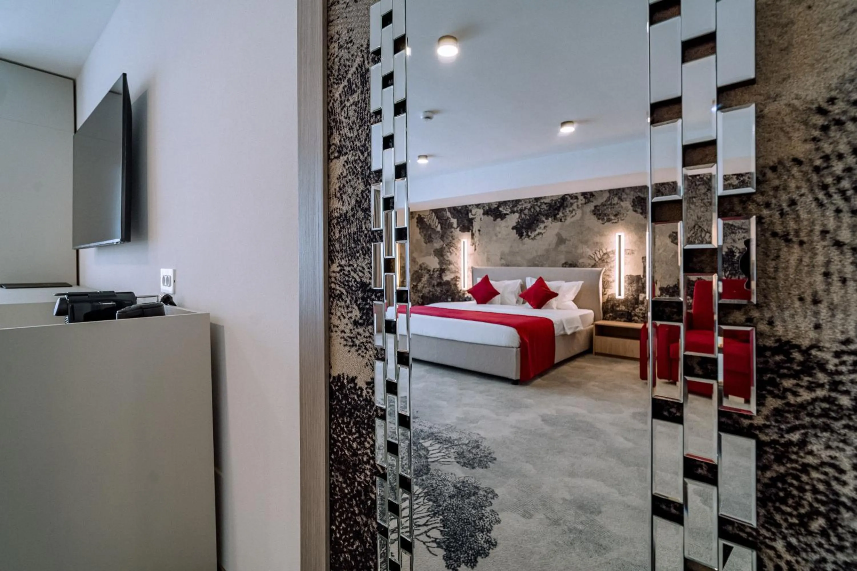 Bed in ARIS Boutique Hotel & SPA