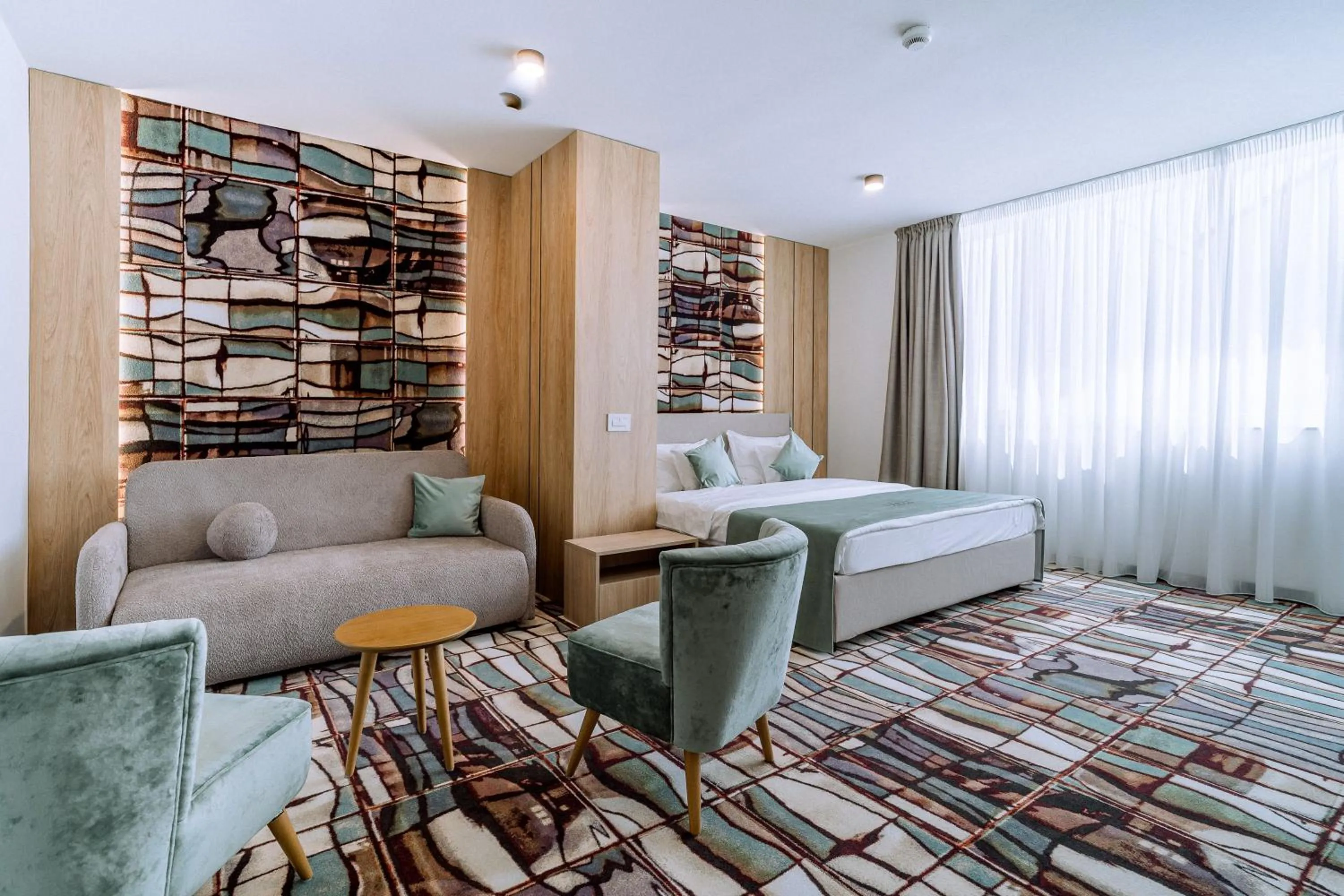 Bed in ARIS Boutique Hotel & SPA