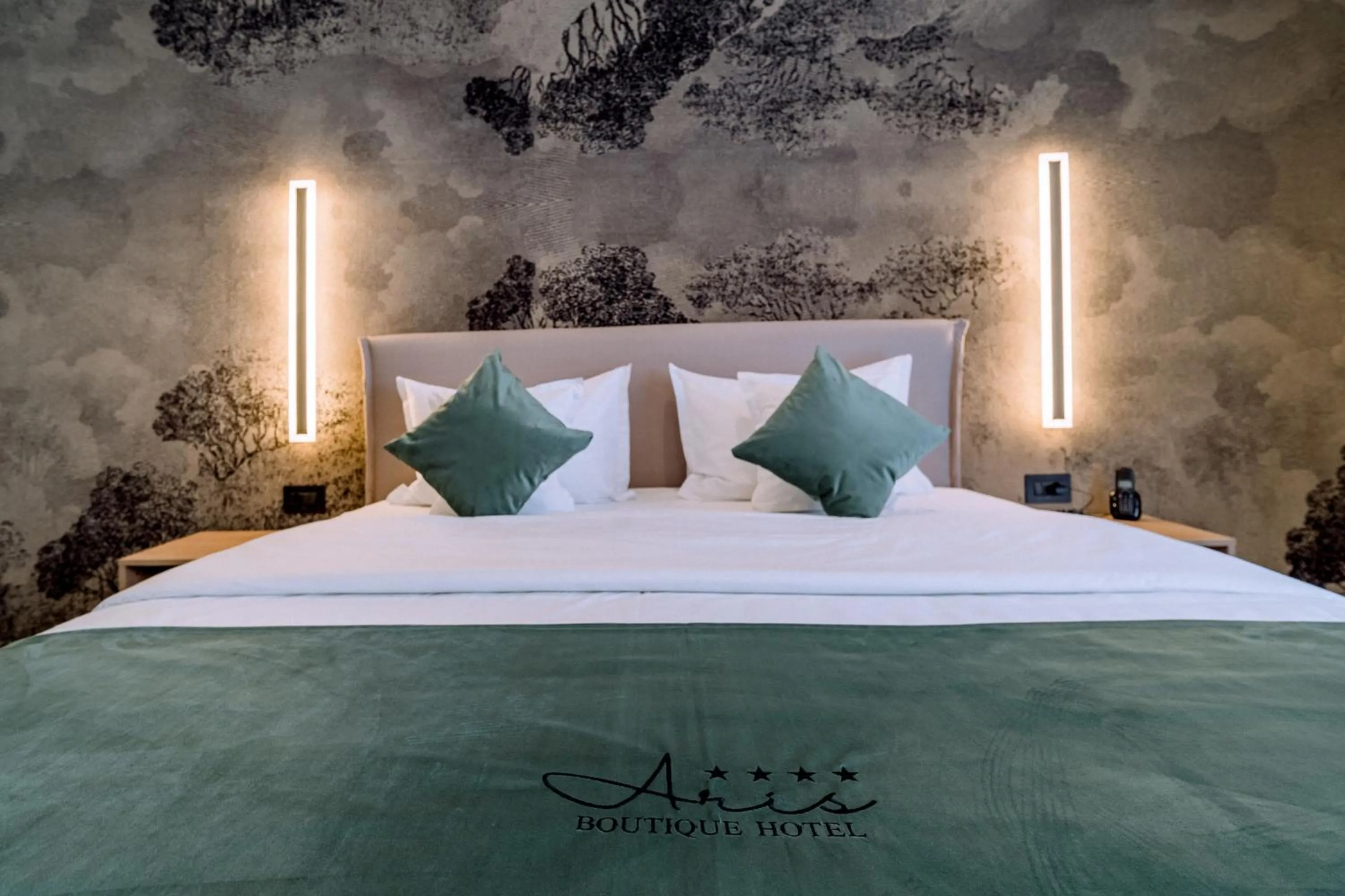 Bed in ARIS Boutique Hotel & SPA