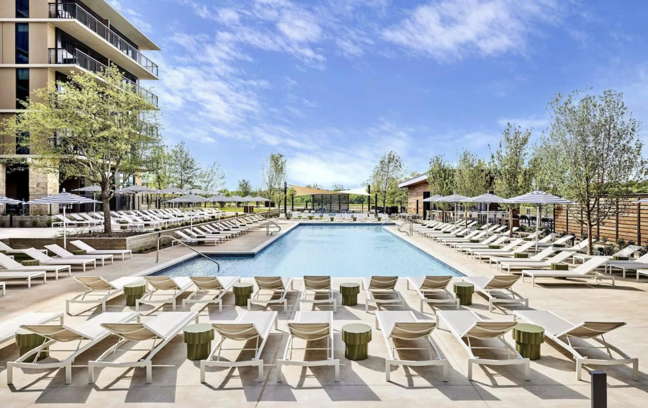 Swimming pool in Omni PGA Frisco Resort by Suiteness