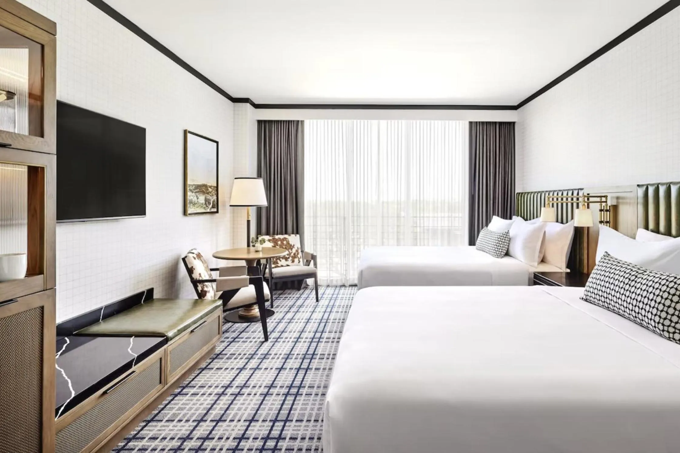 Bed in Omni PGA Frisco Resort by Suiteness