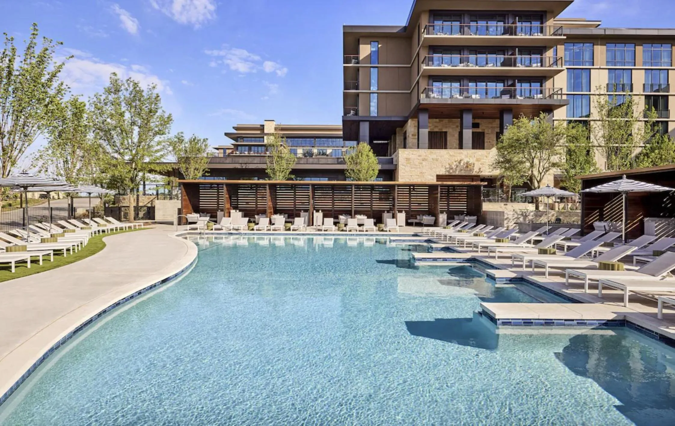 Swimming pool in Omni PGA Frisco Resort by Suiteness