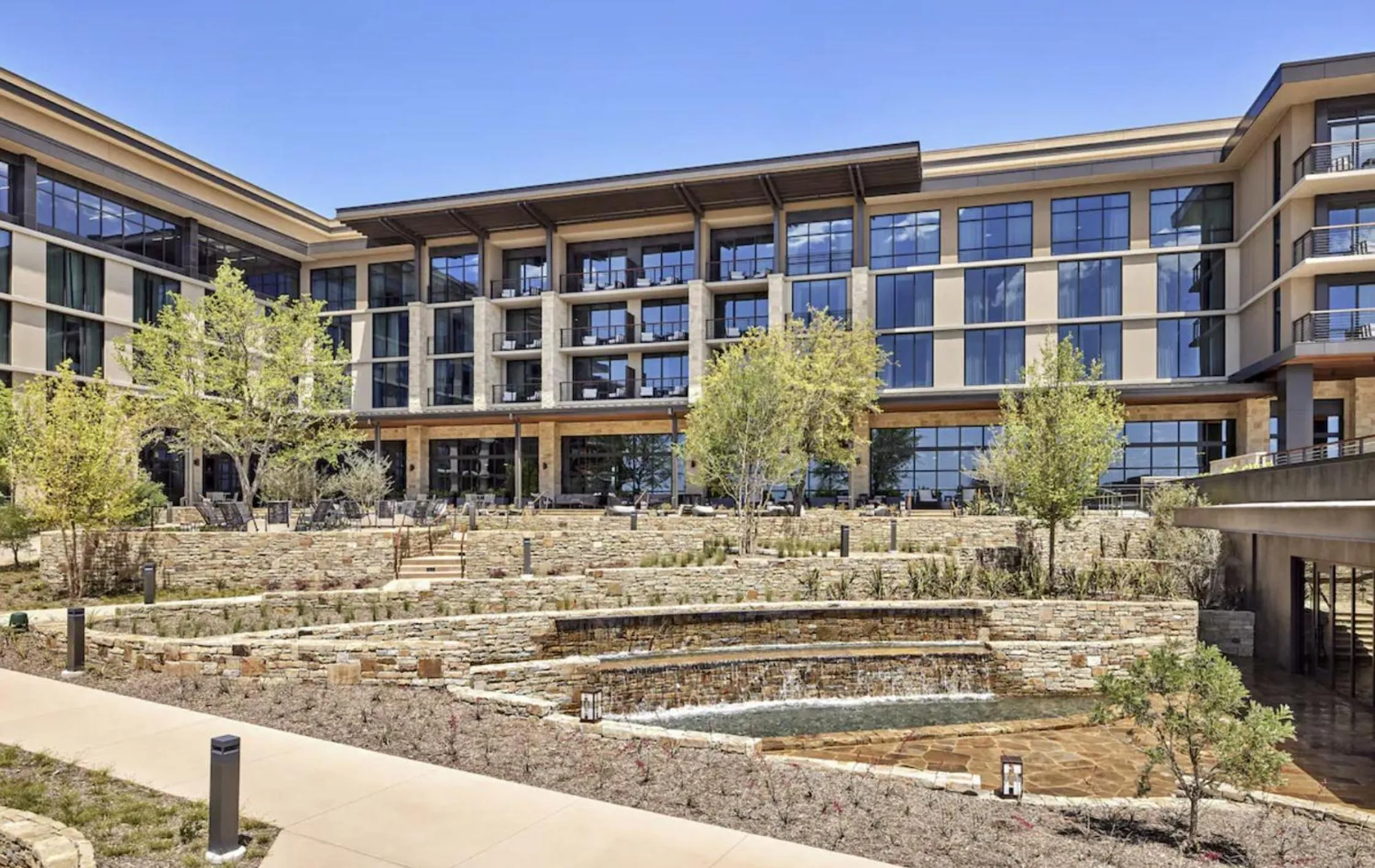 Property building in Omni PGA Frisco Resort by Suiteness