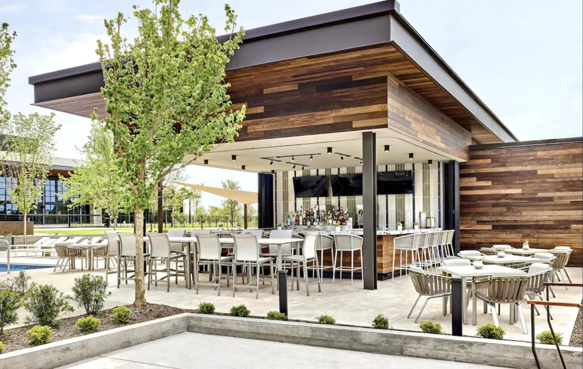 Lounge or bar in Omni PGA Frisco Resort by Suiteness