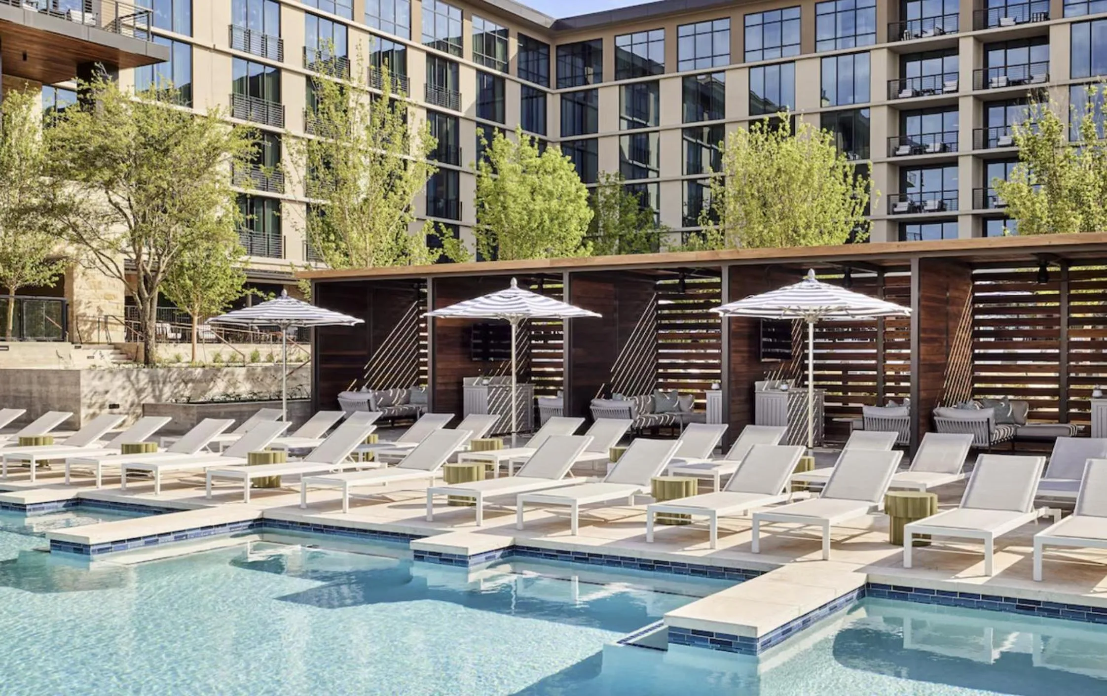 Swimming pool in Omni PGA Frisco Resort by Suiteness