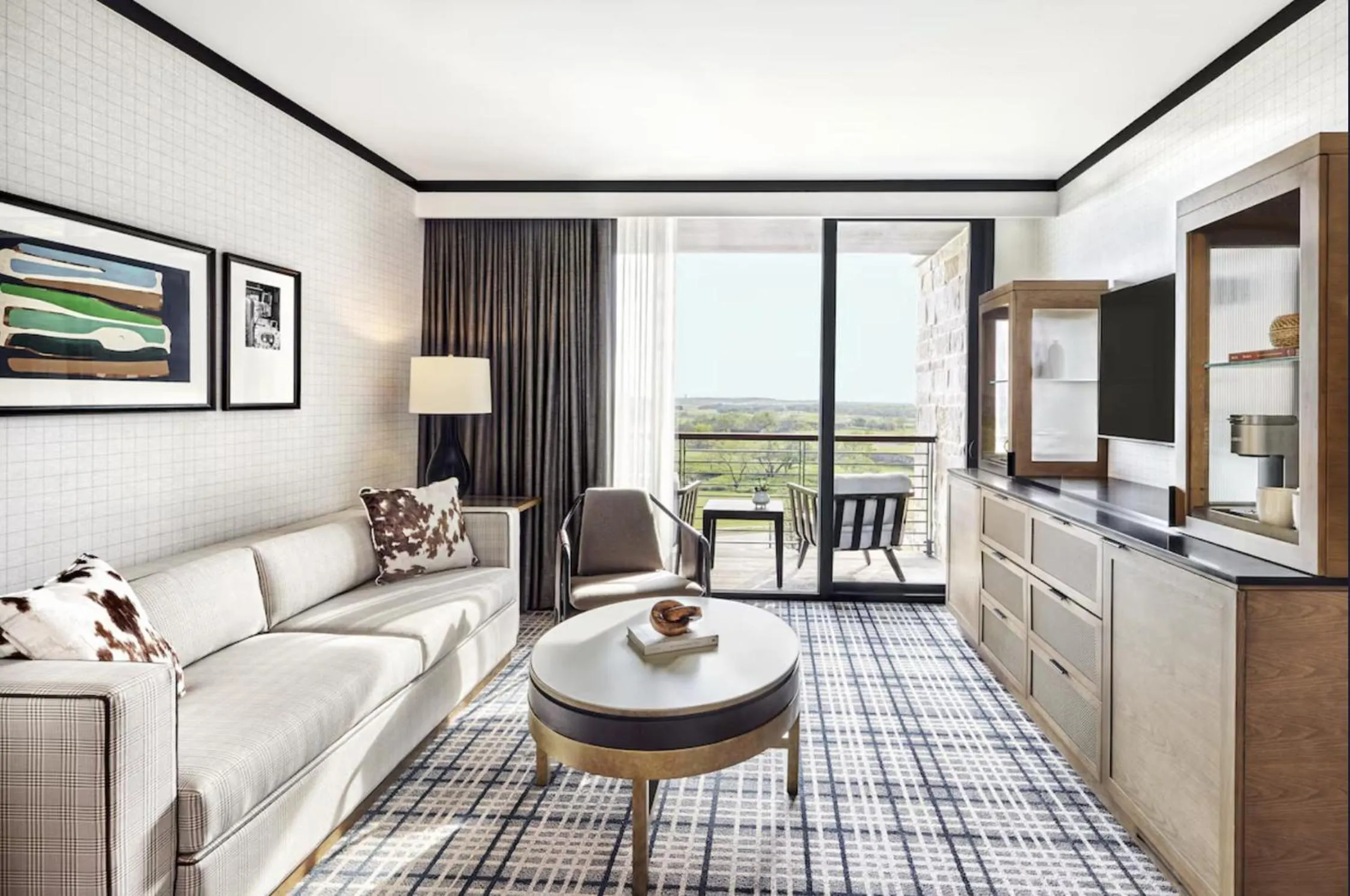 Living room in Omni PGA Frisco Resort by Suiteness