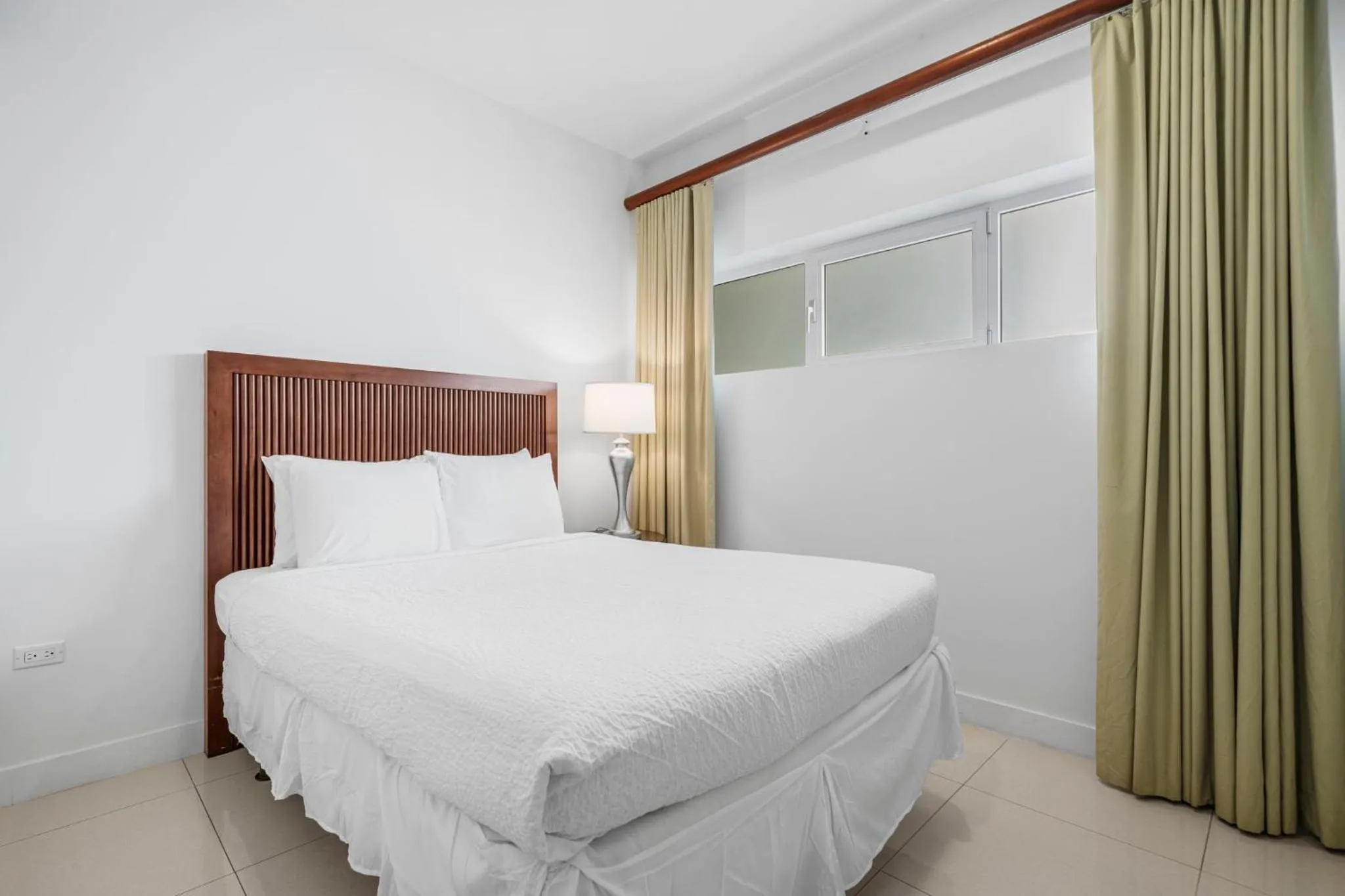 Bed in Aruba's Life Residences