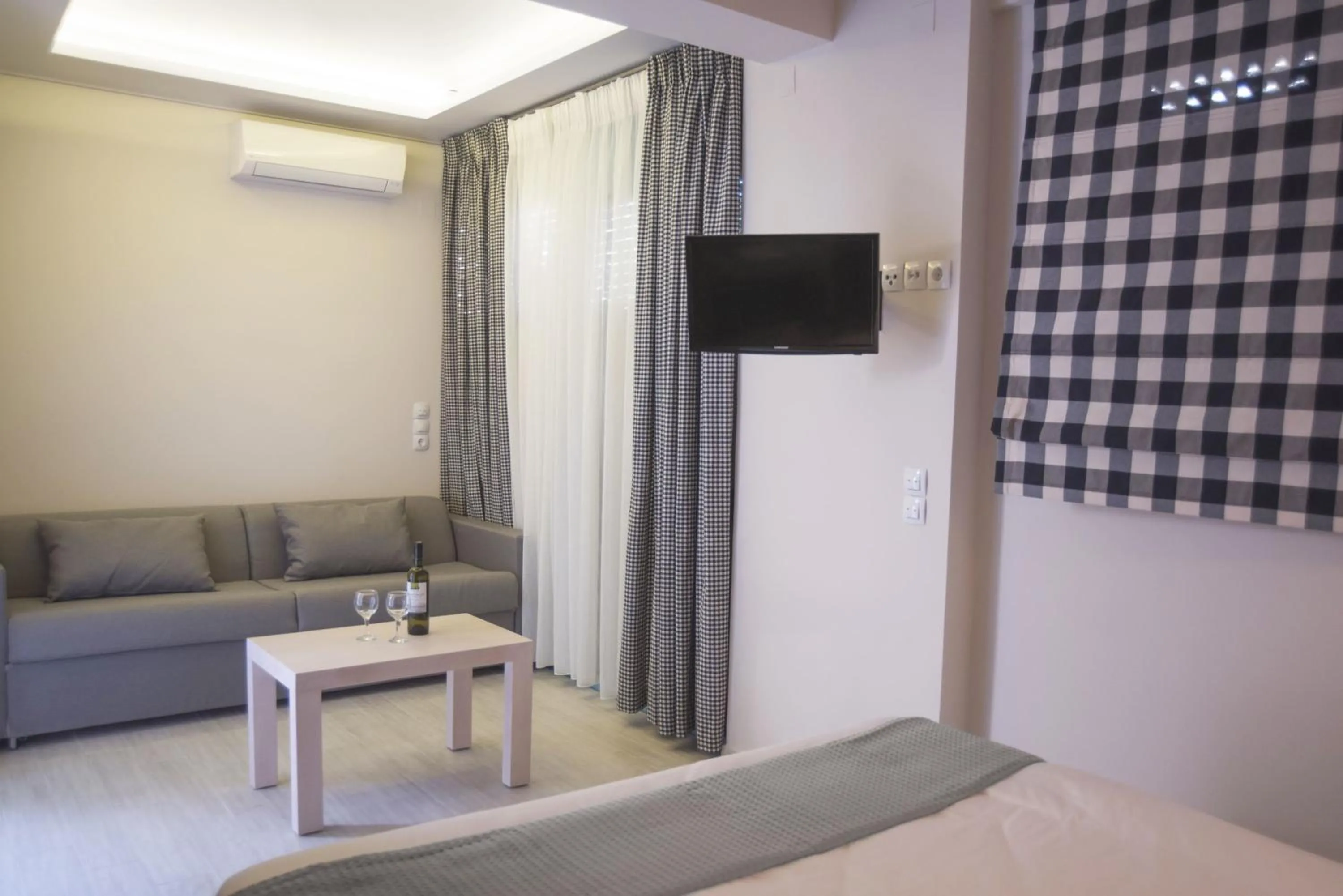 Living room, Bed in The Ionian View