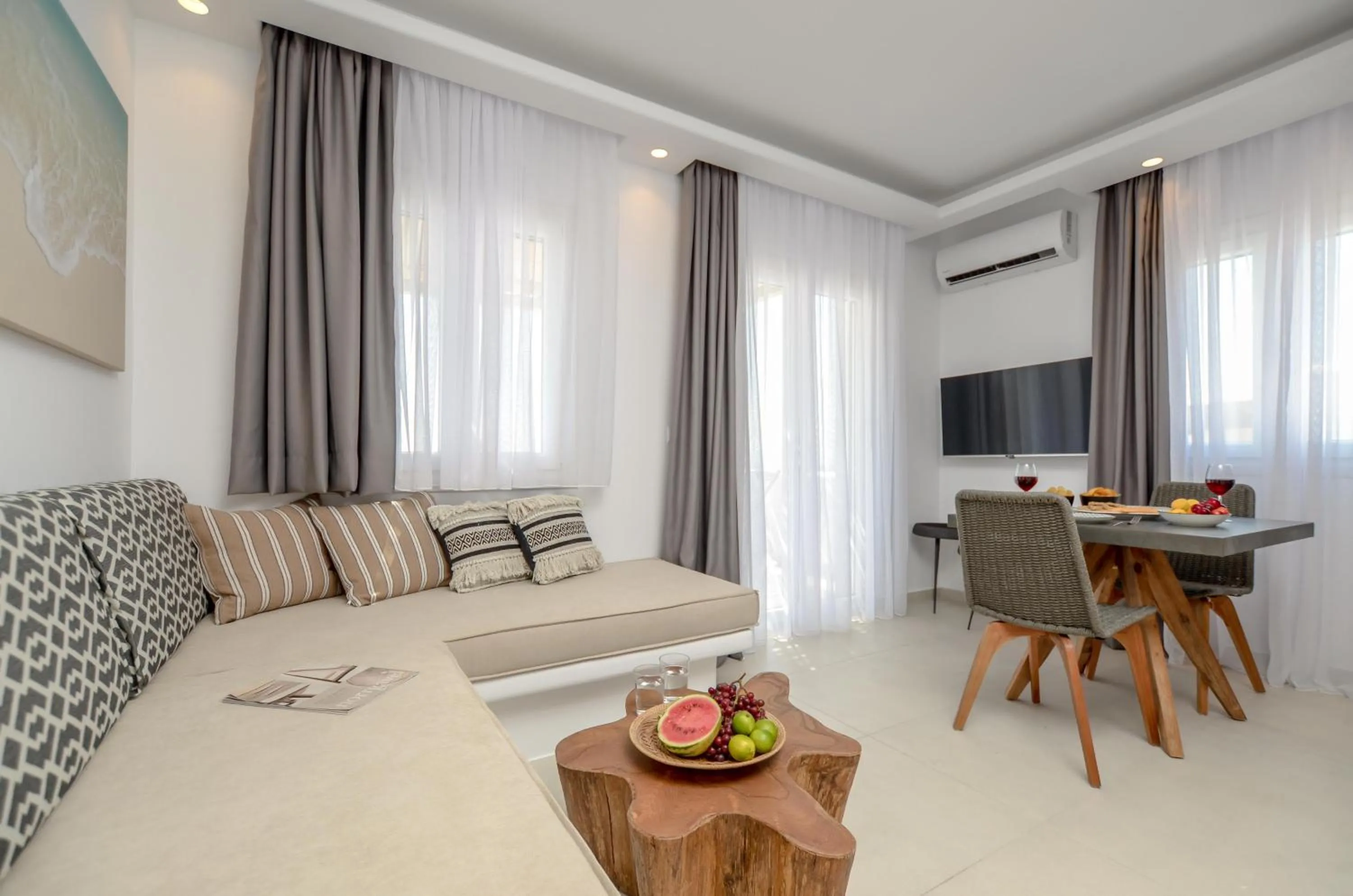 TV and multimedia in Sea & Olives Suites Hotel and Villas