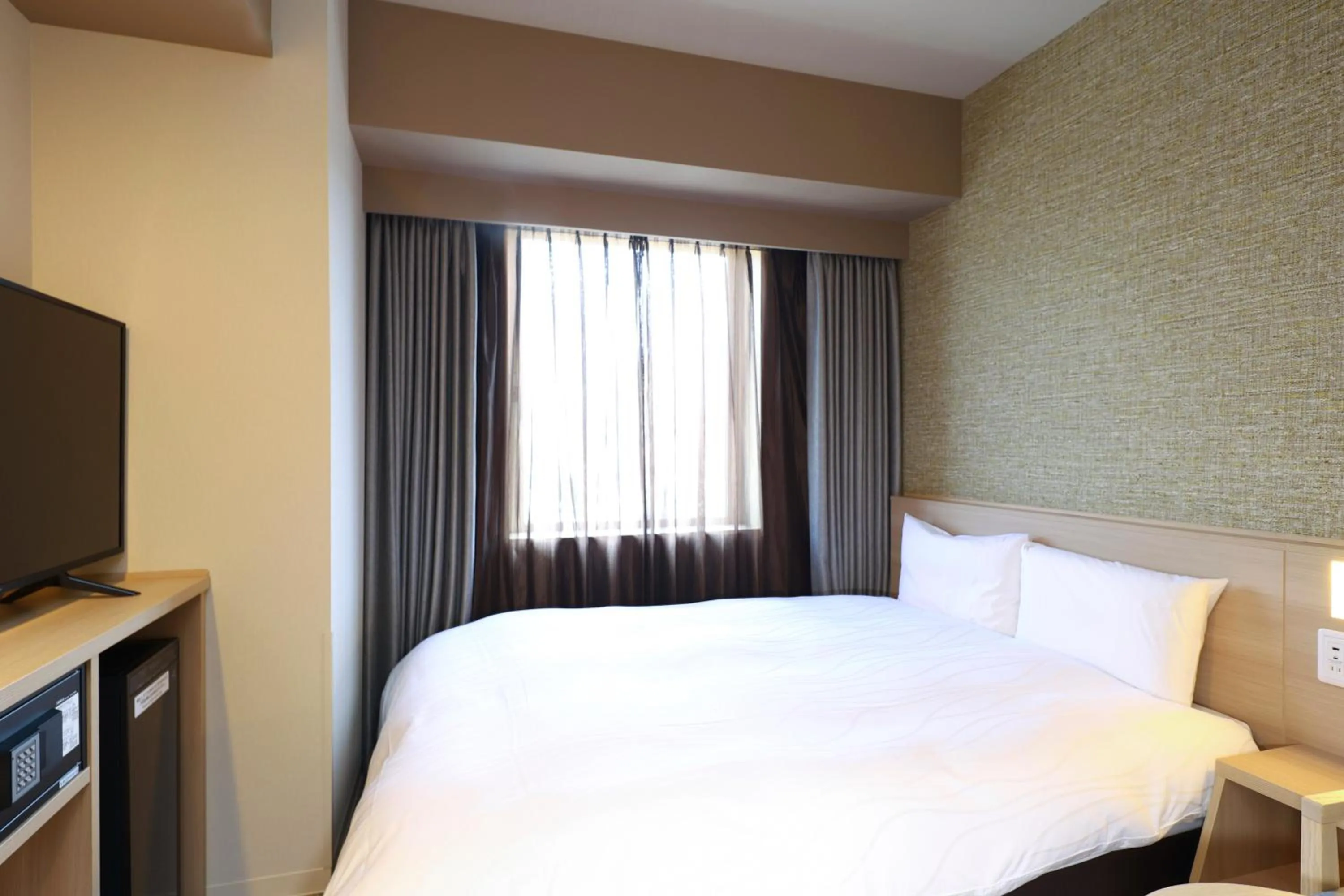 Photo of the whole room, Bed in Dormy Inn Tsuruga Natural Hot Spring