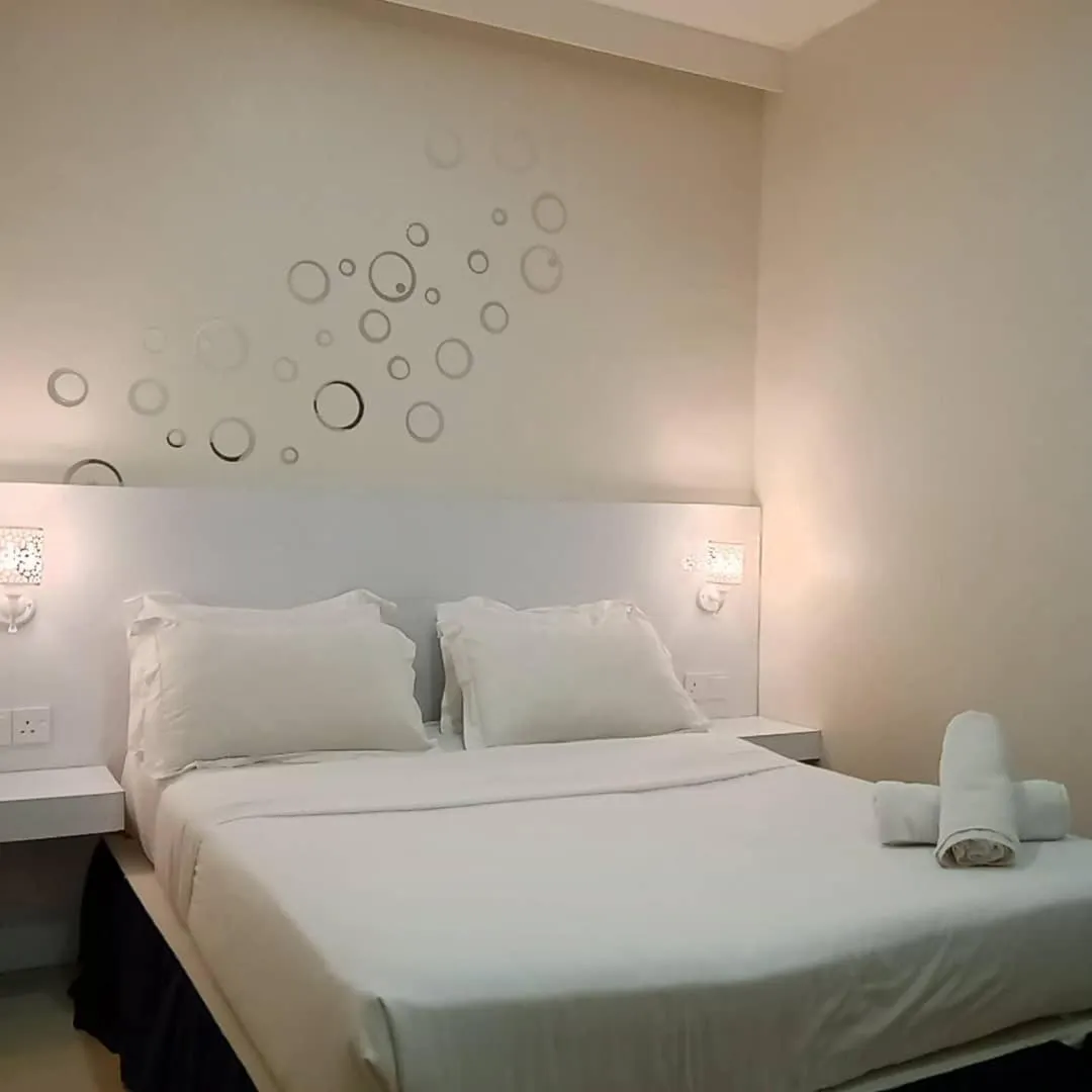 Bed in Sunsega Hotel