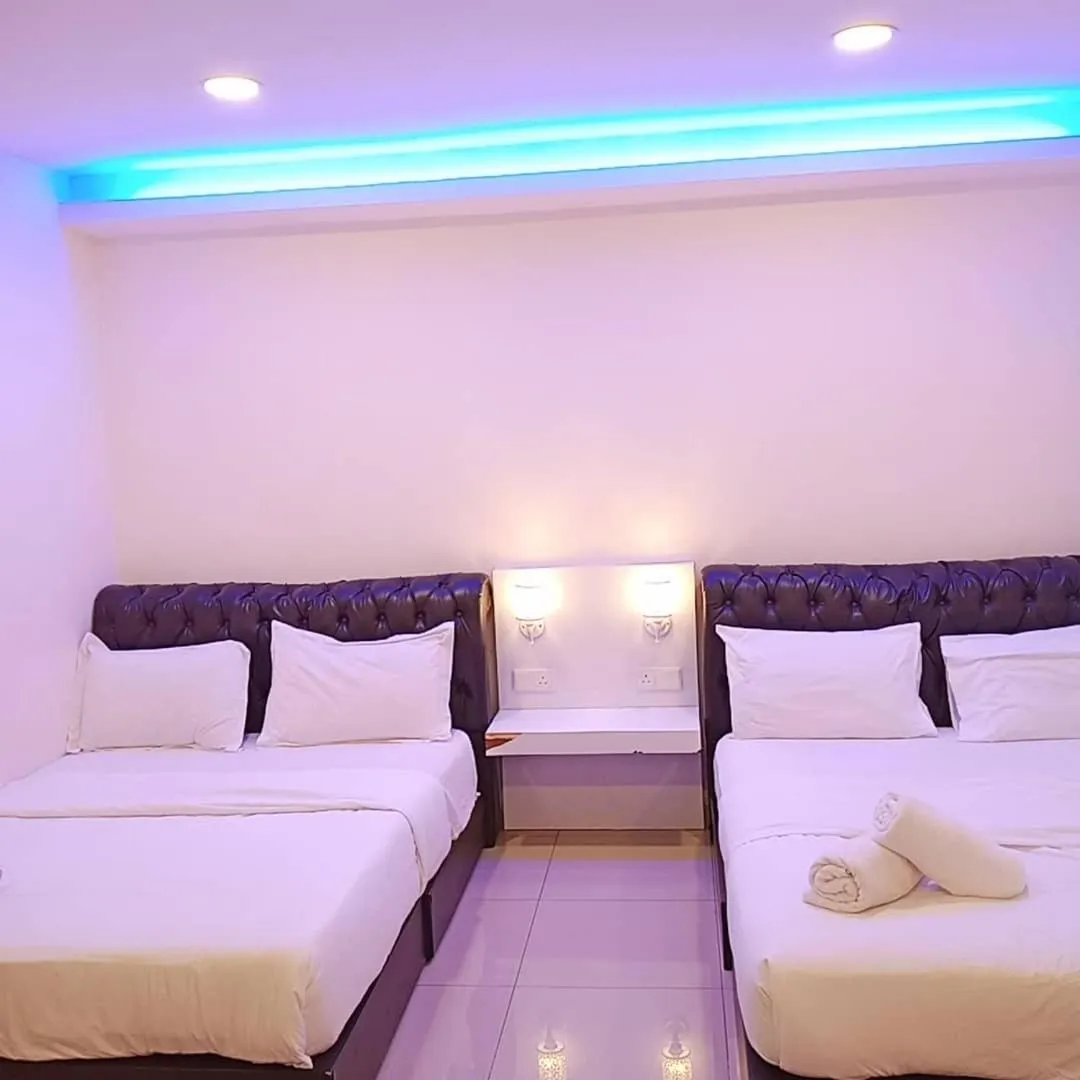 Bed in Sunsega Hotel