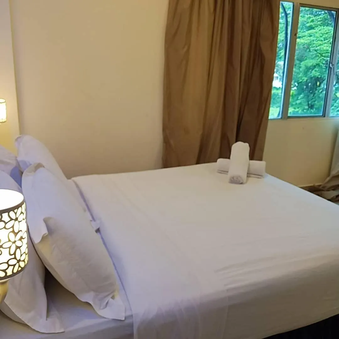 Bed in Sunsega Hotel