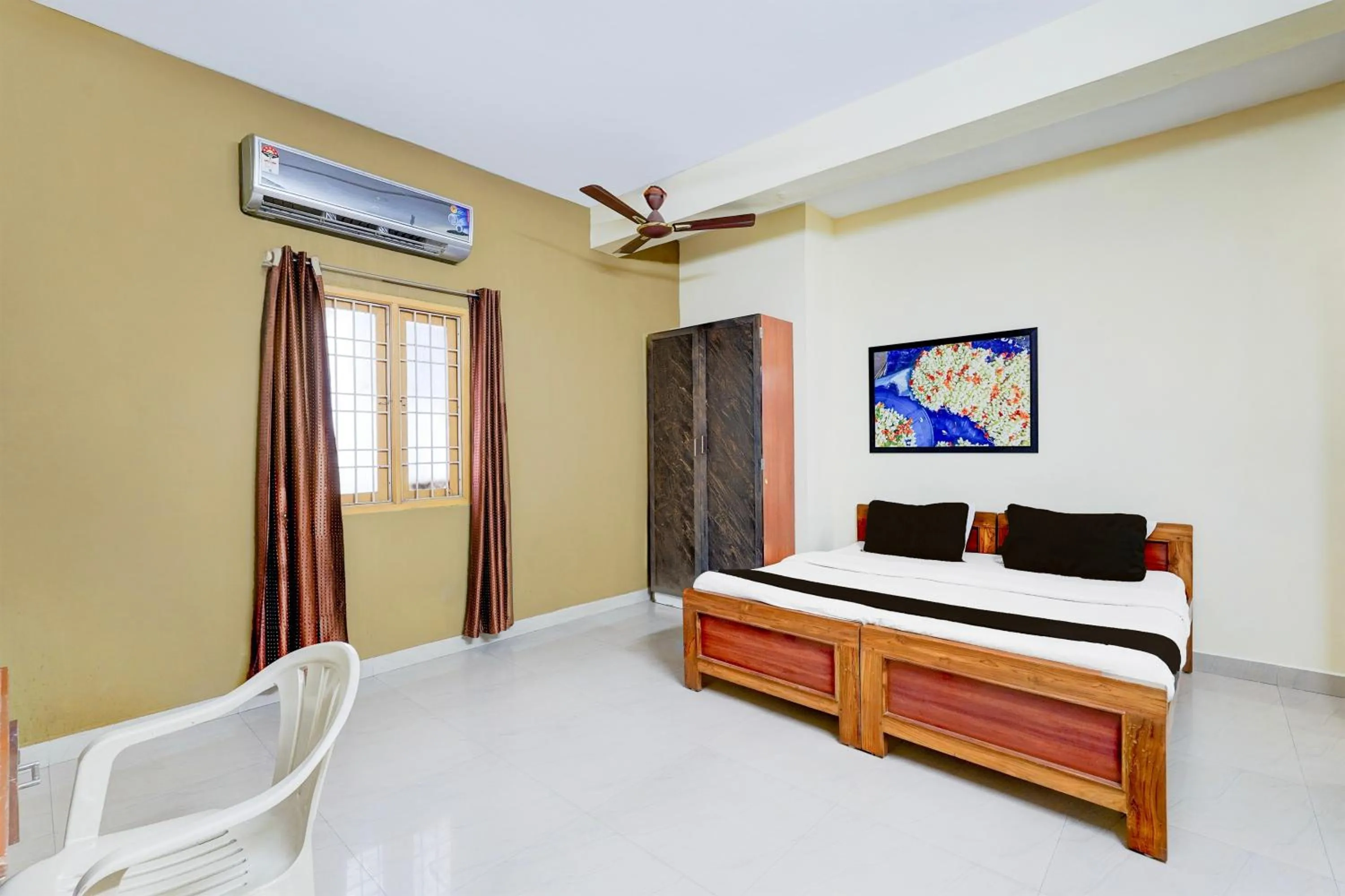 Bedroom in Super Hotel O Villivakkam Railway Station Formerly BV Stayz