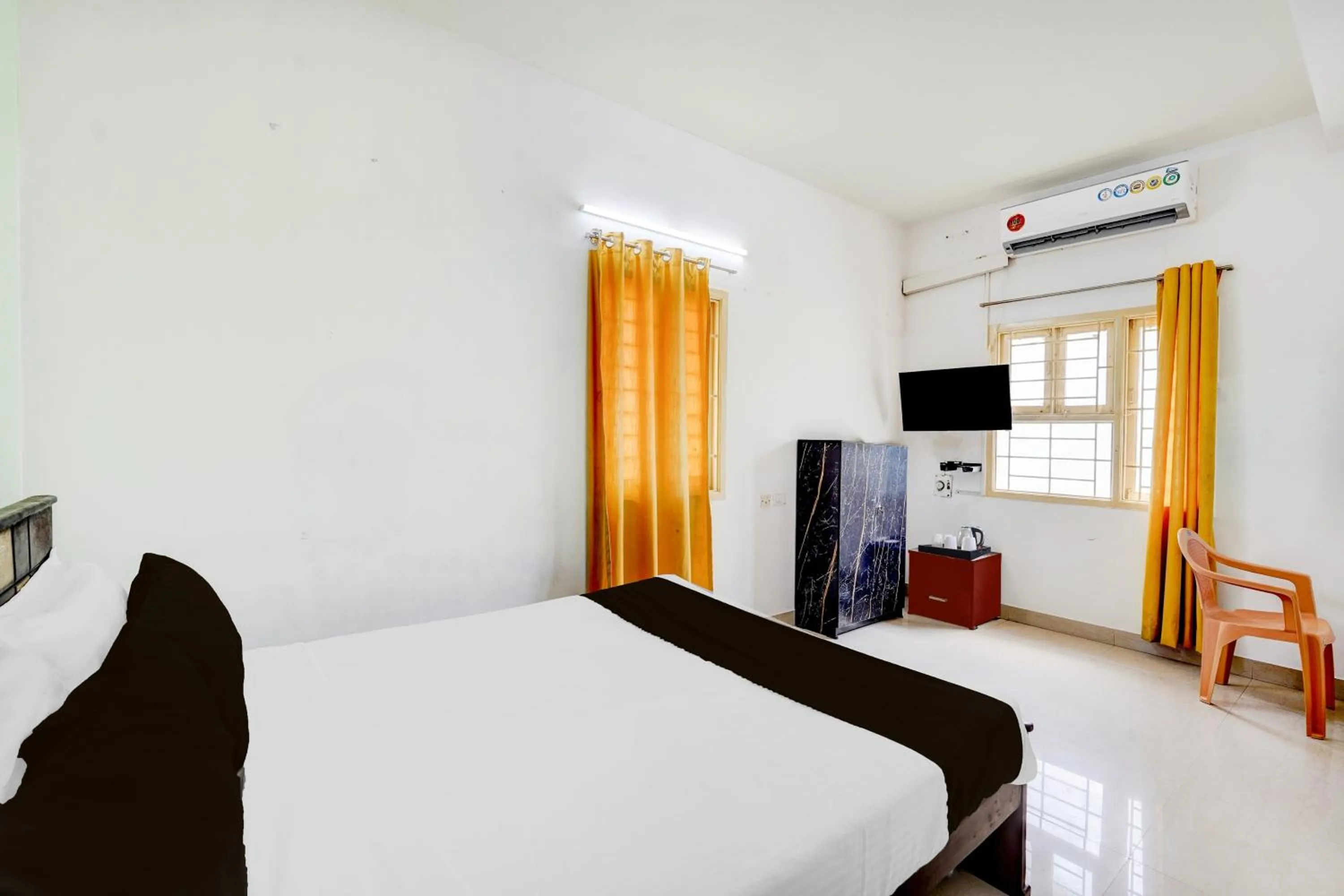 Classic Triple Room - single occupancy in Super Hotel O Kelambakkam Bus Terminal Formerly Guna Residency