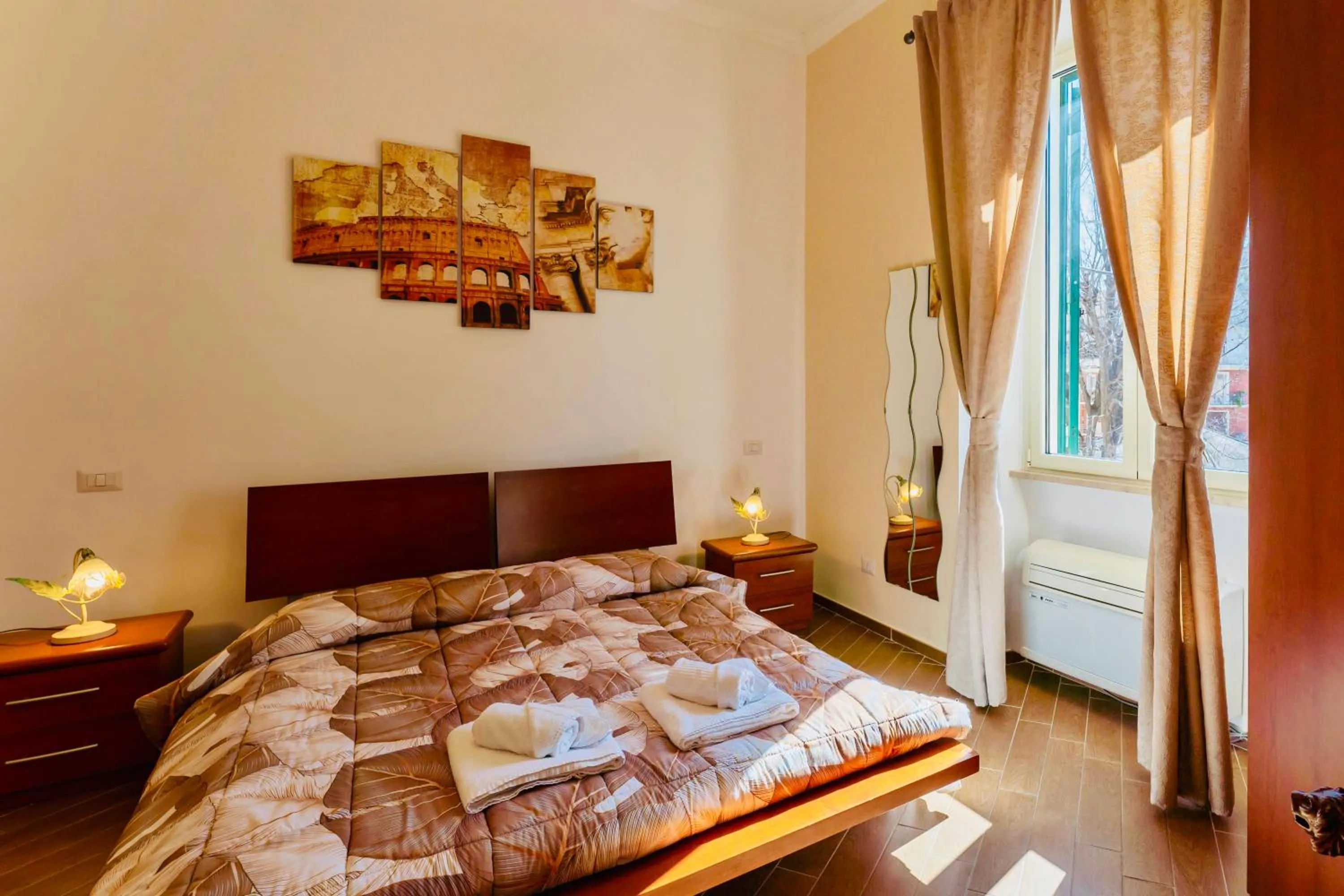 Bed in MICLAD Colosseum Guest House