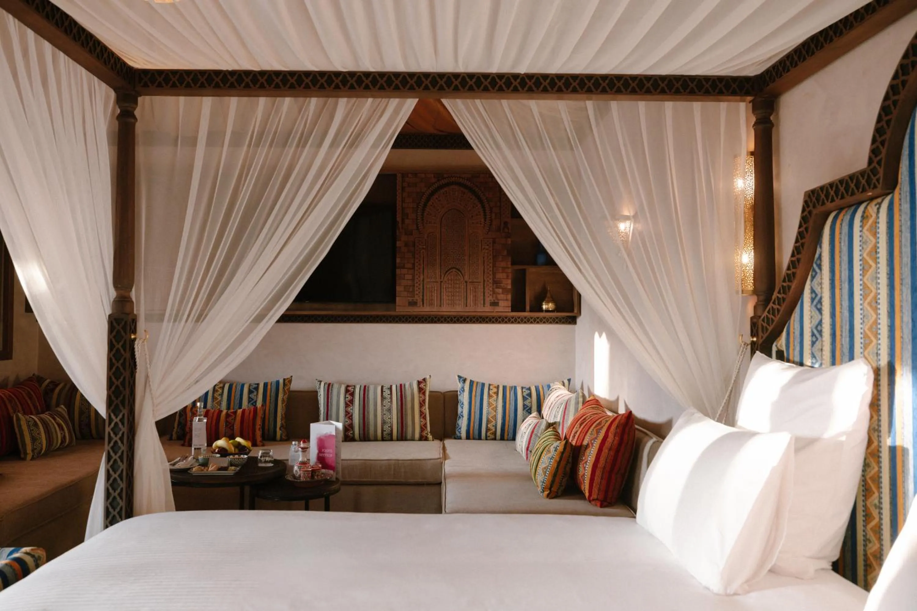 Living room, Bed in Palmeraie Oasis Camp - A member of Barcelo Hotel Group
