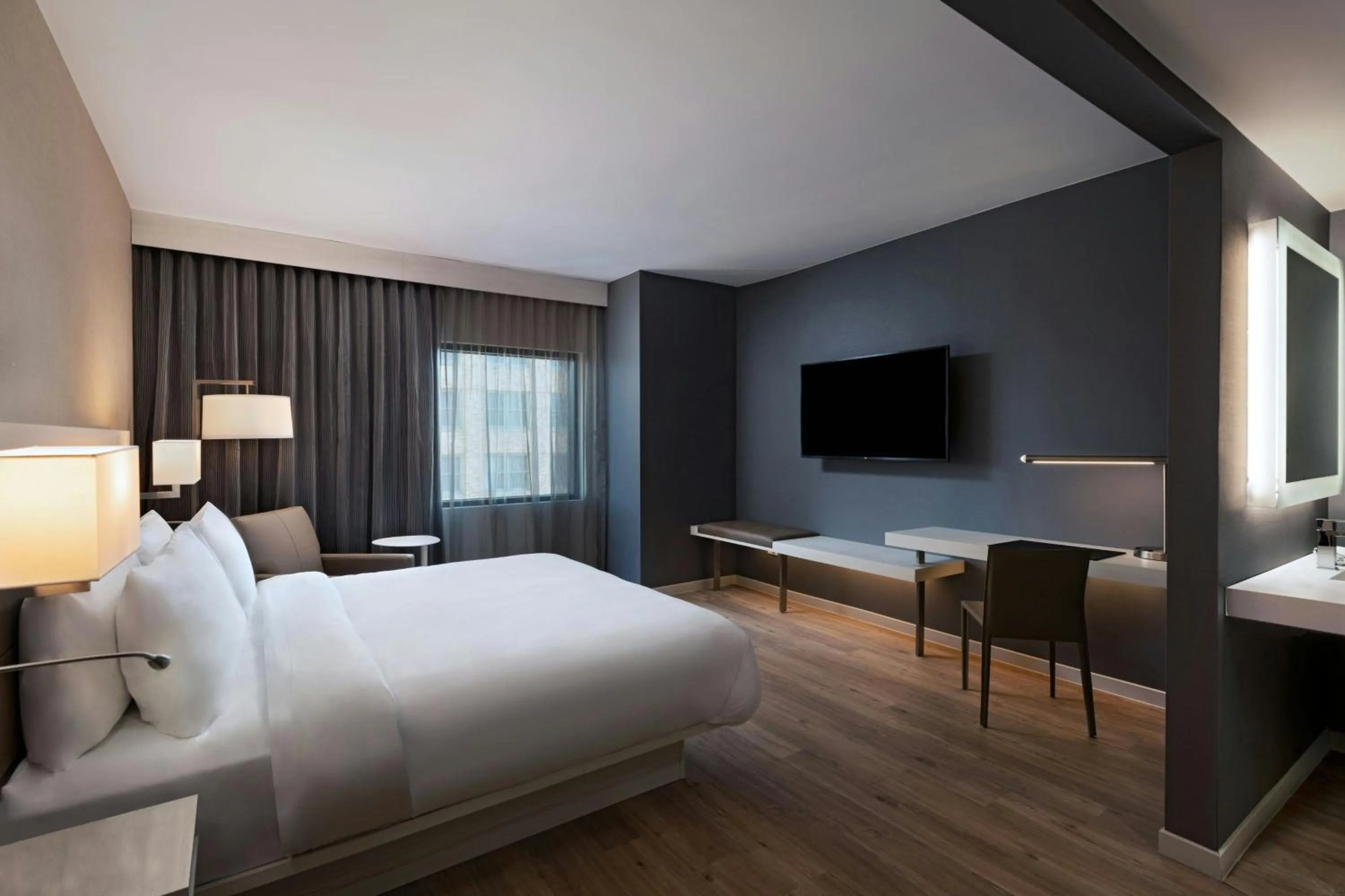 Photo of the whole room, Bed in AC Hotel by Marriott Las Vegas Symphony Park