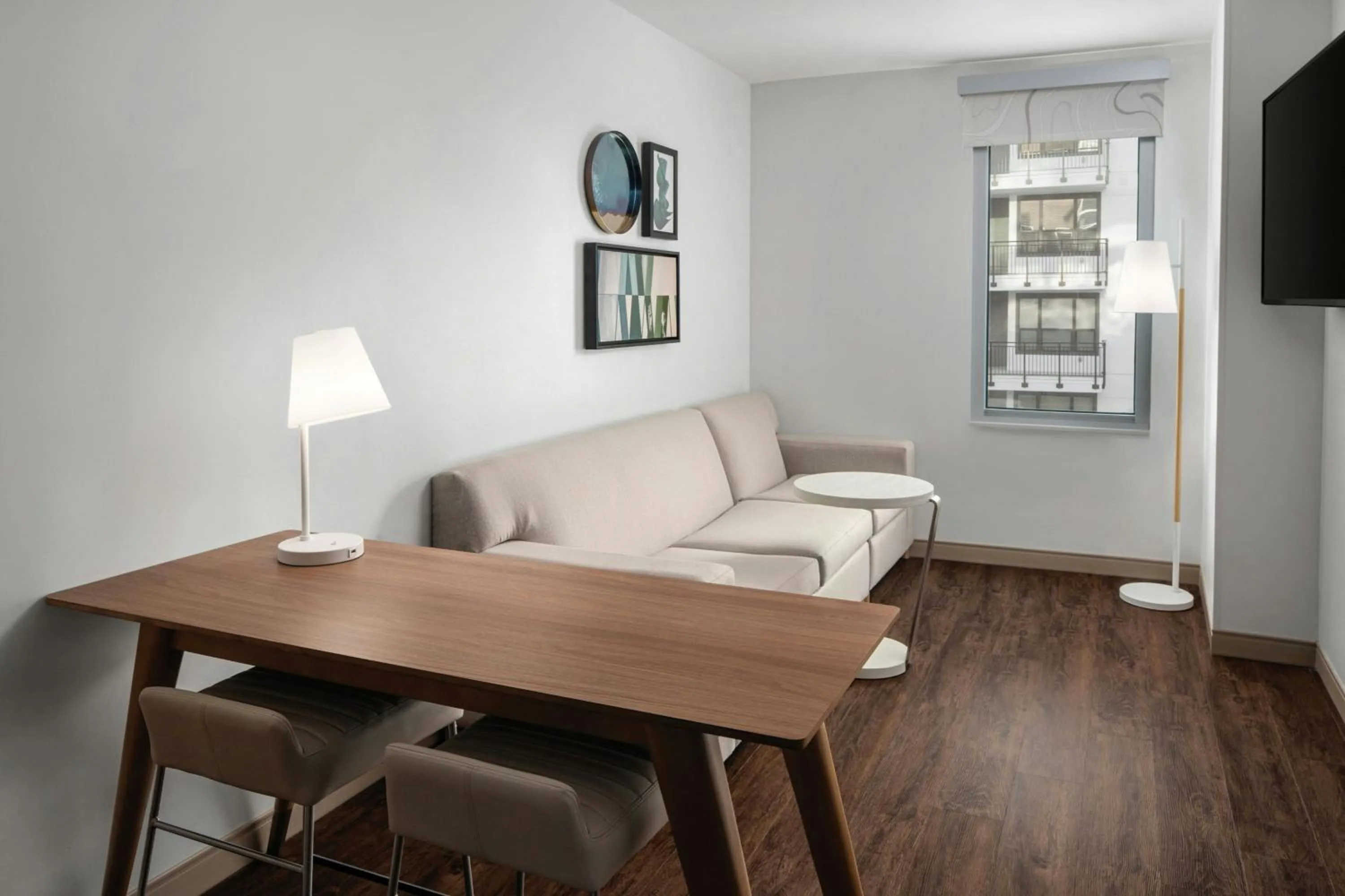 Living room, Bed in Element Calgary Downtown