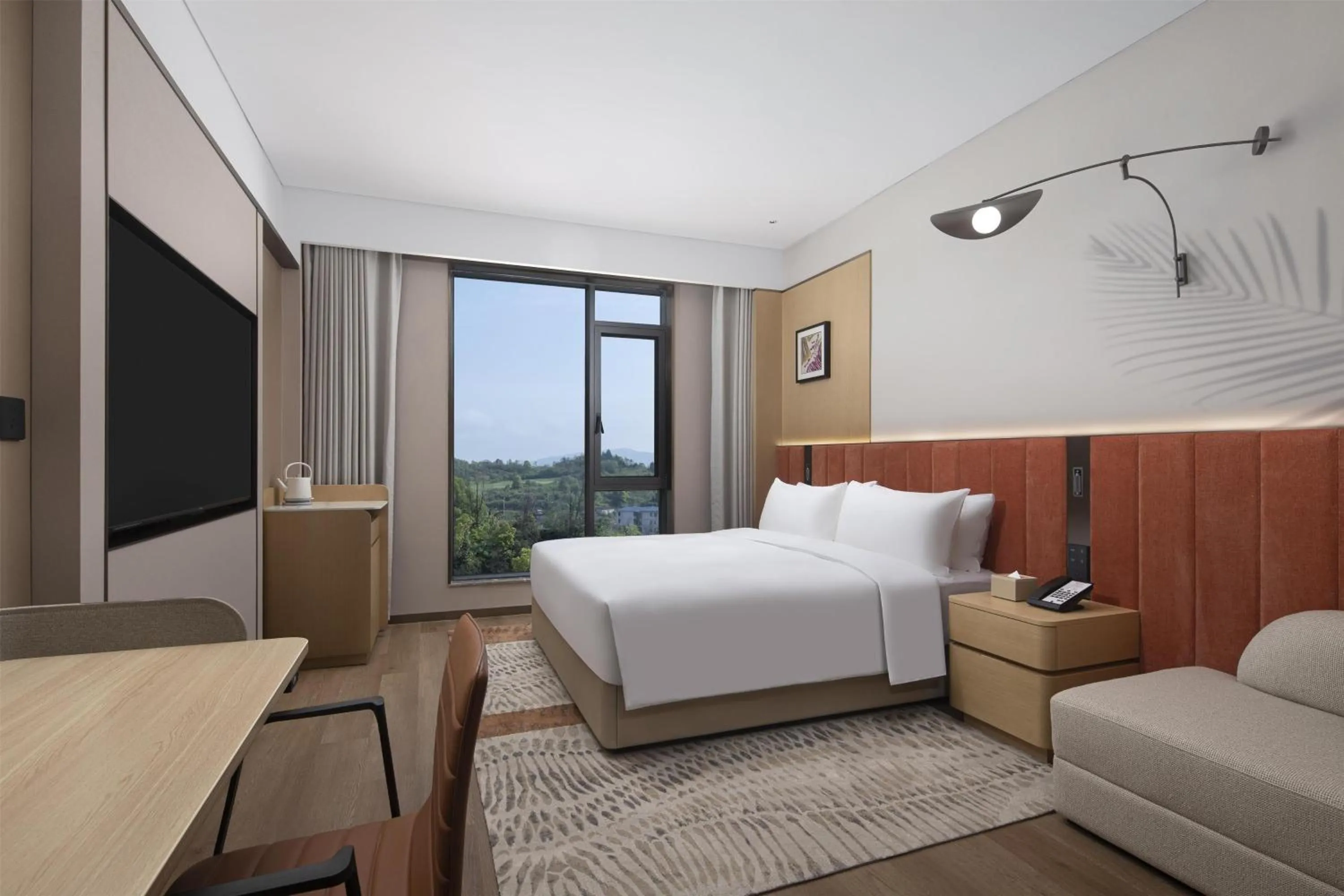 Bed in Hilton Garden Inn Zhangjiajie Tianmen Mountain