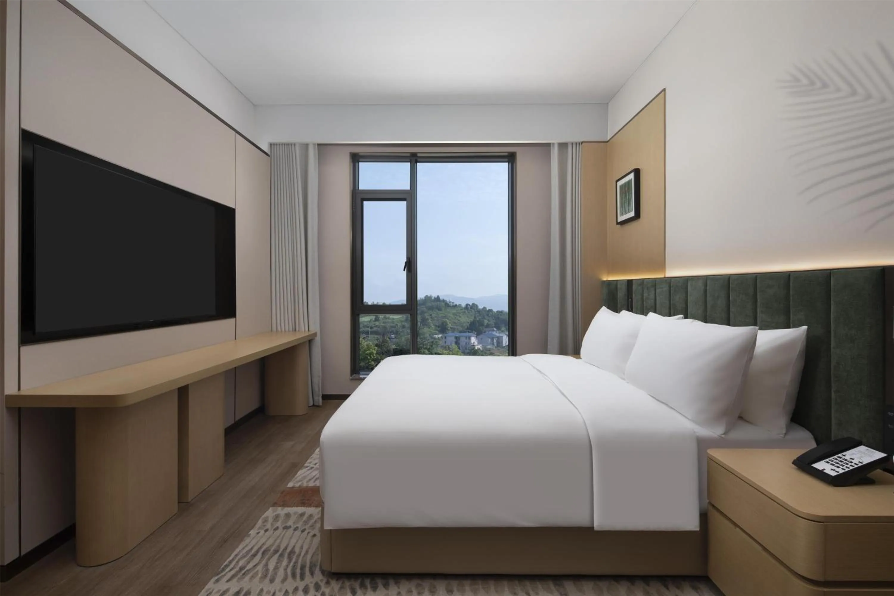 Bed in Hilton Garden Inn Zhangjiajie Tianmen Mountain