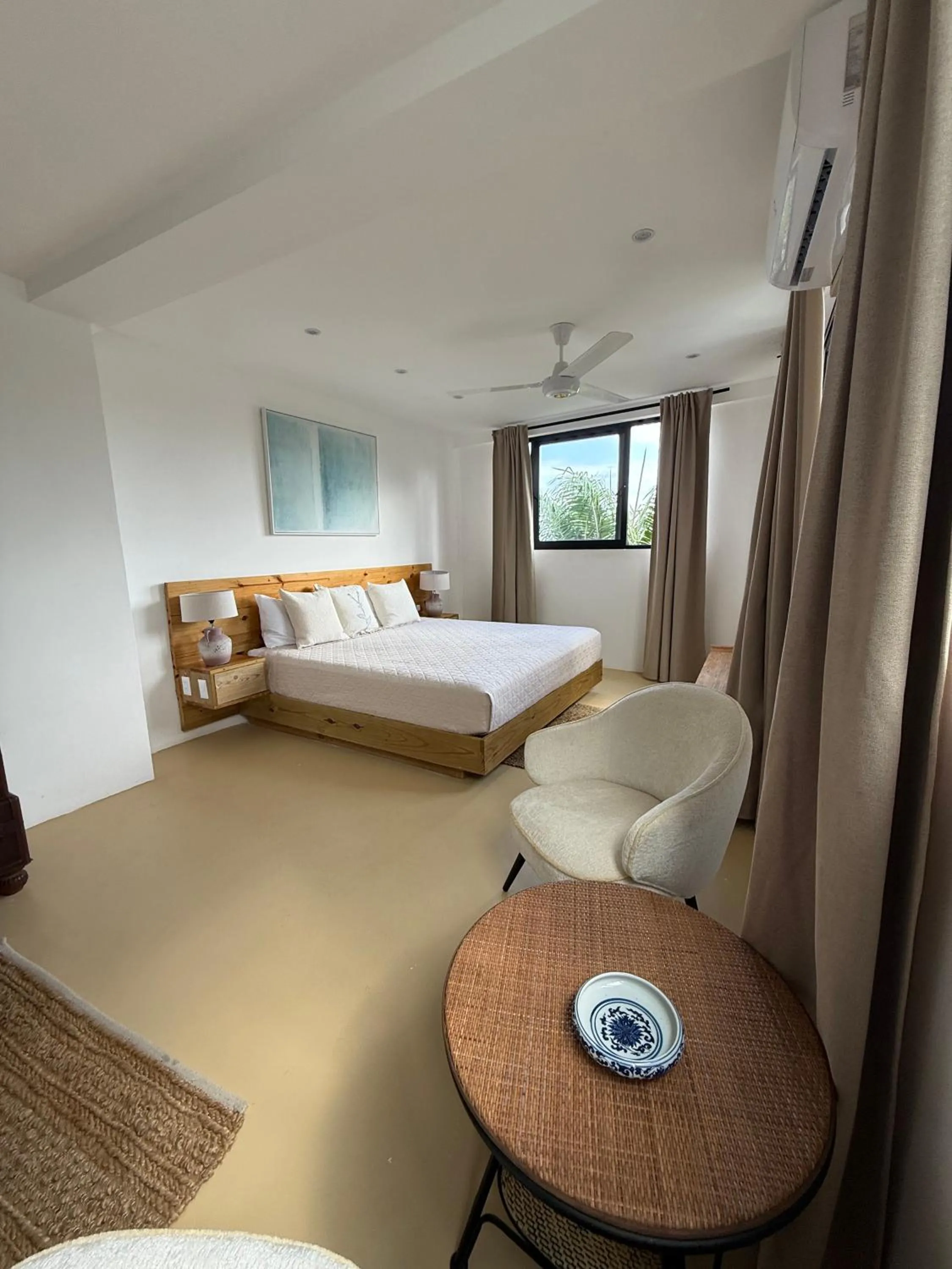 Photo of the whole room, Bed in Kainos Tropical Boutique Hotel