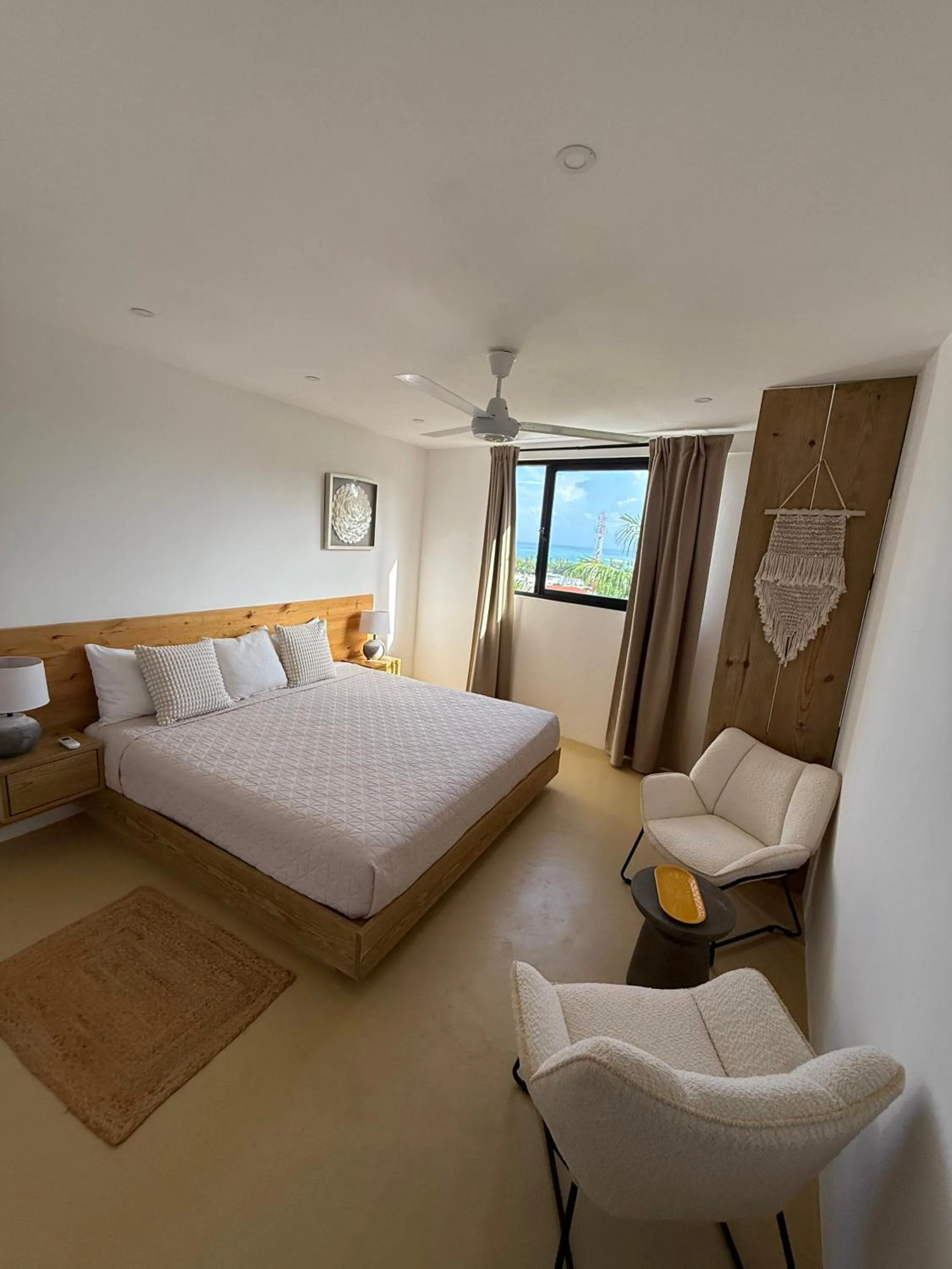 Photo of the whole room, Bed in Kainos Tropical Boutique Hotel