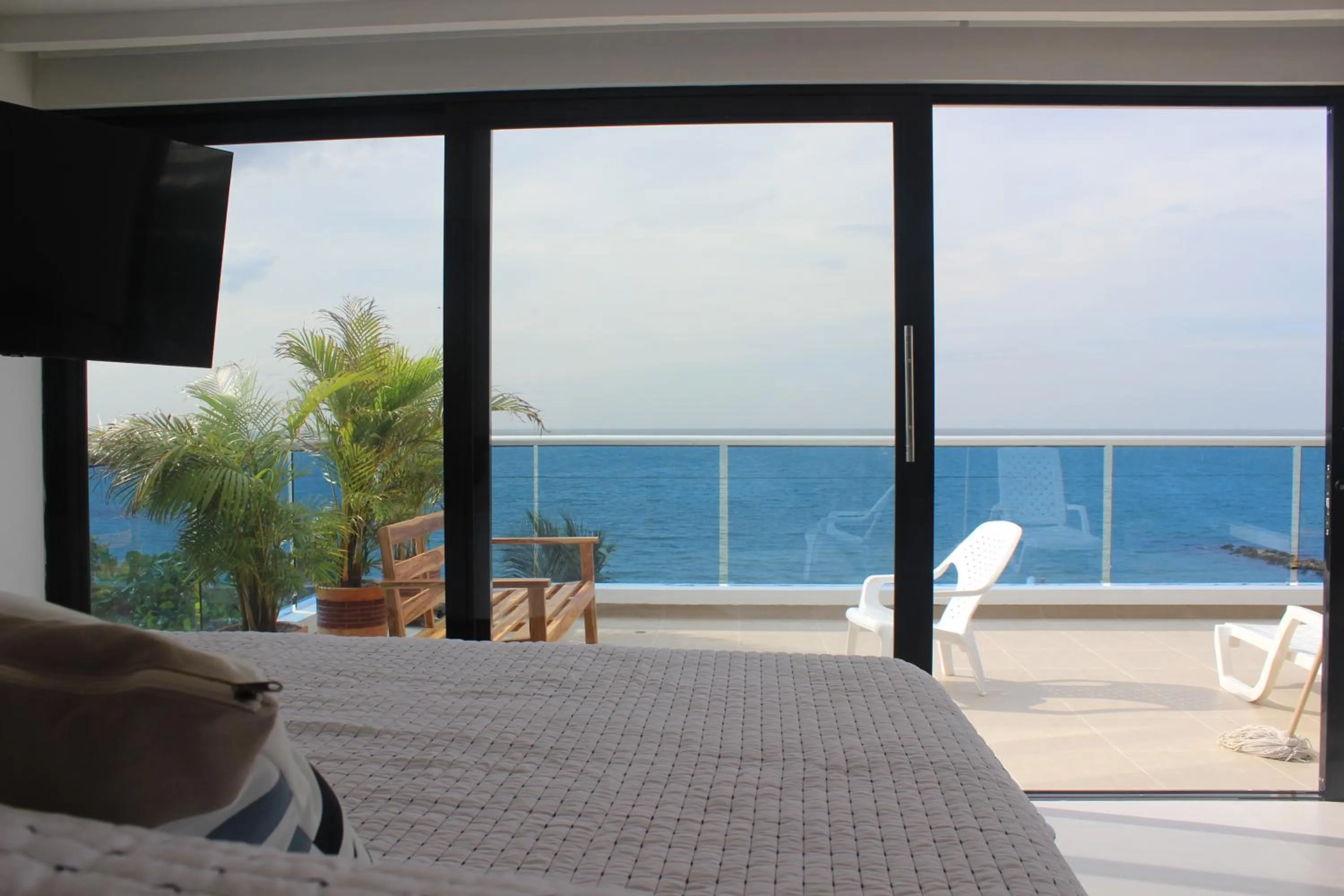 Photo of the whole room, Bed in Camino Palmero Coveñas