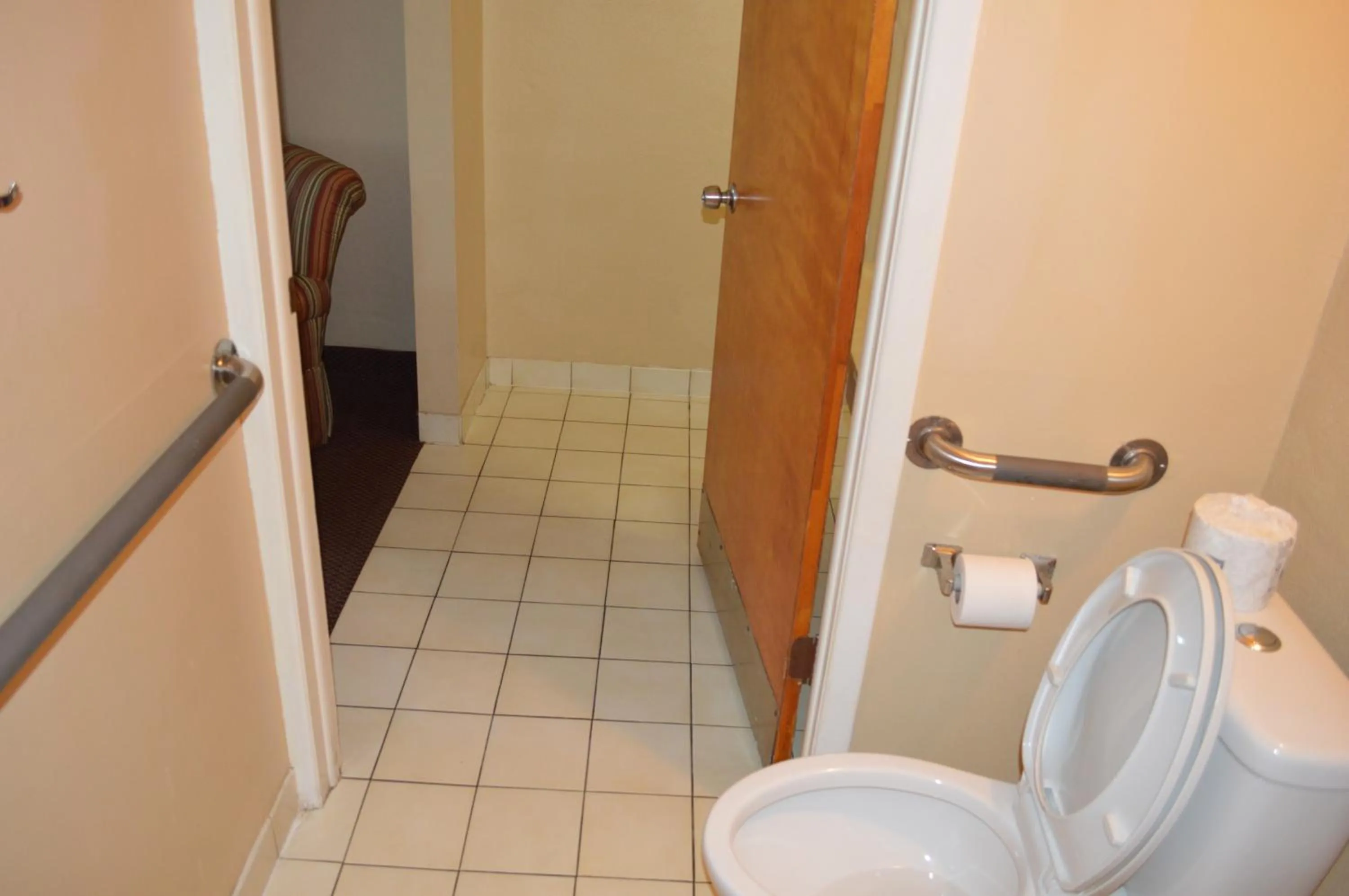 Toilet in Tarpon Shores Inn