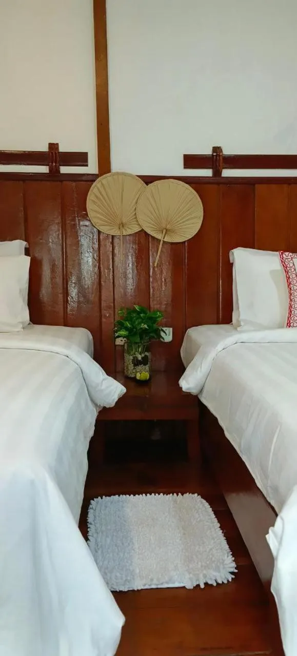 Bed in Maison Model d'Angkor