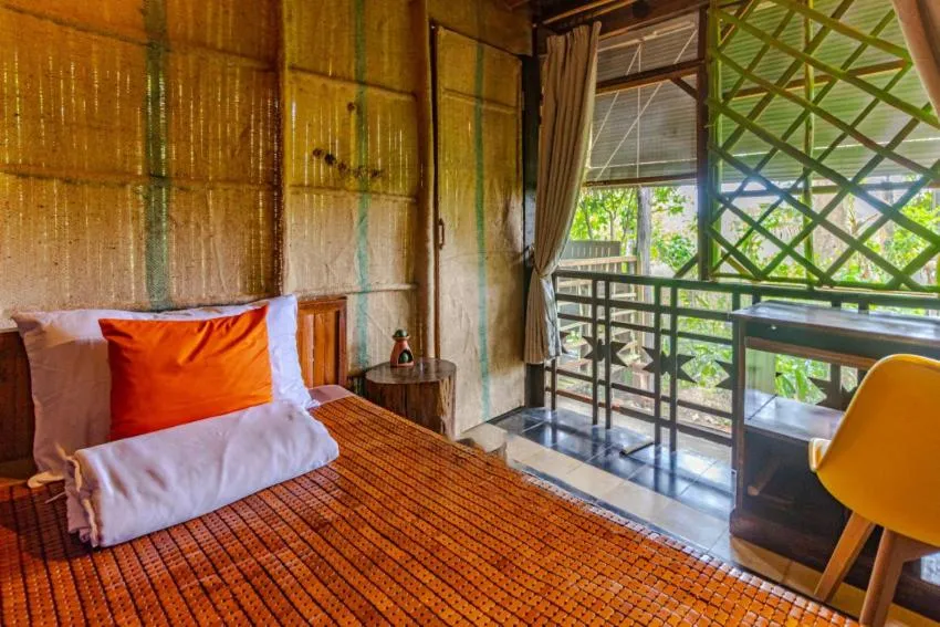 Bed in Maison Model d'Angkor