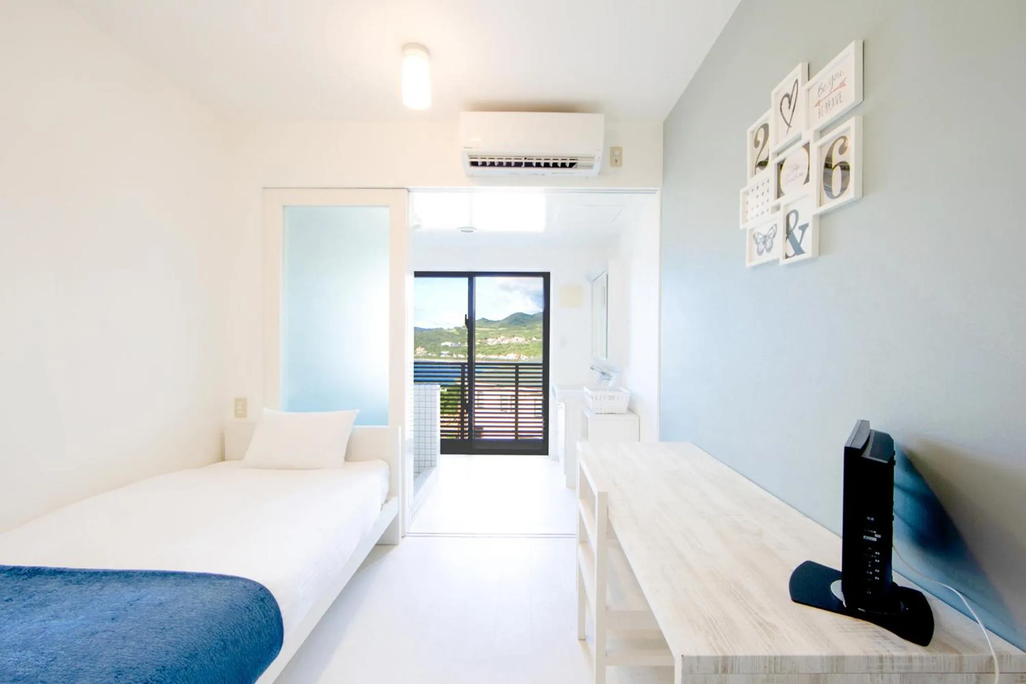 Bed in E-horizon Resort Condominium Sesoko