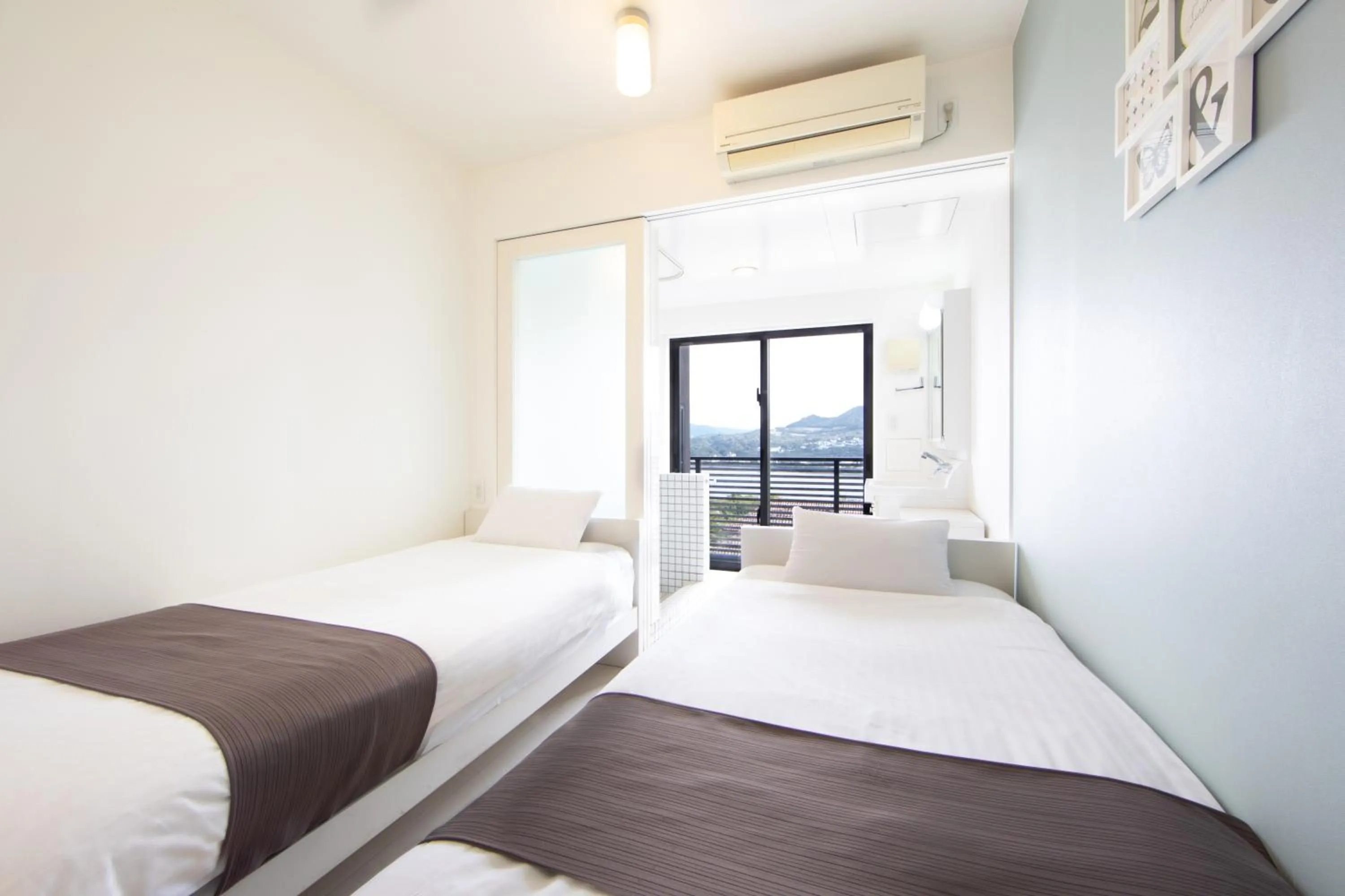 Bed in E-horizon Resort Condominium Sesoko