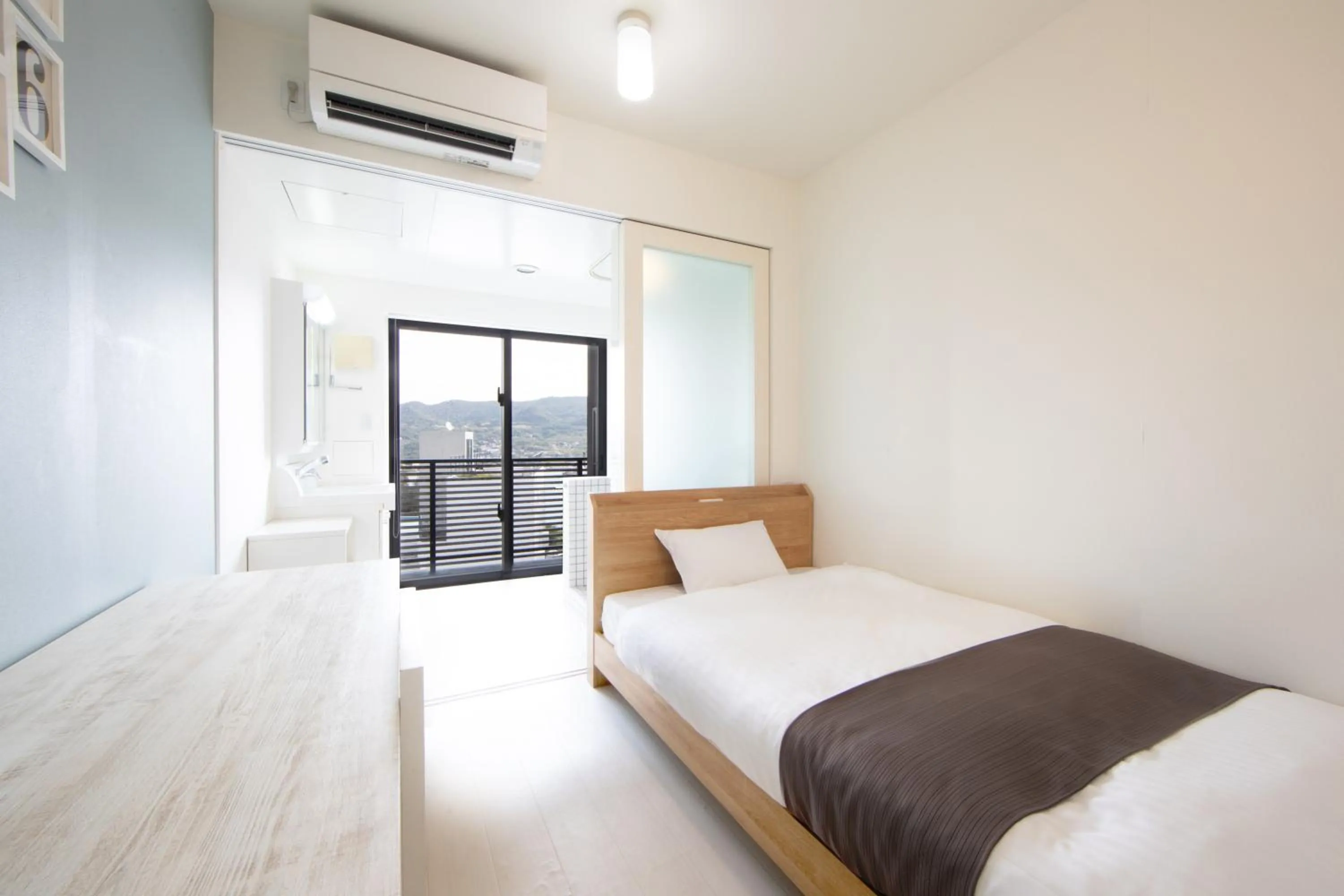 Bed in E-horizon Resort Condominium Sesoko